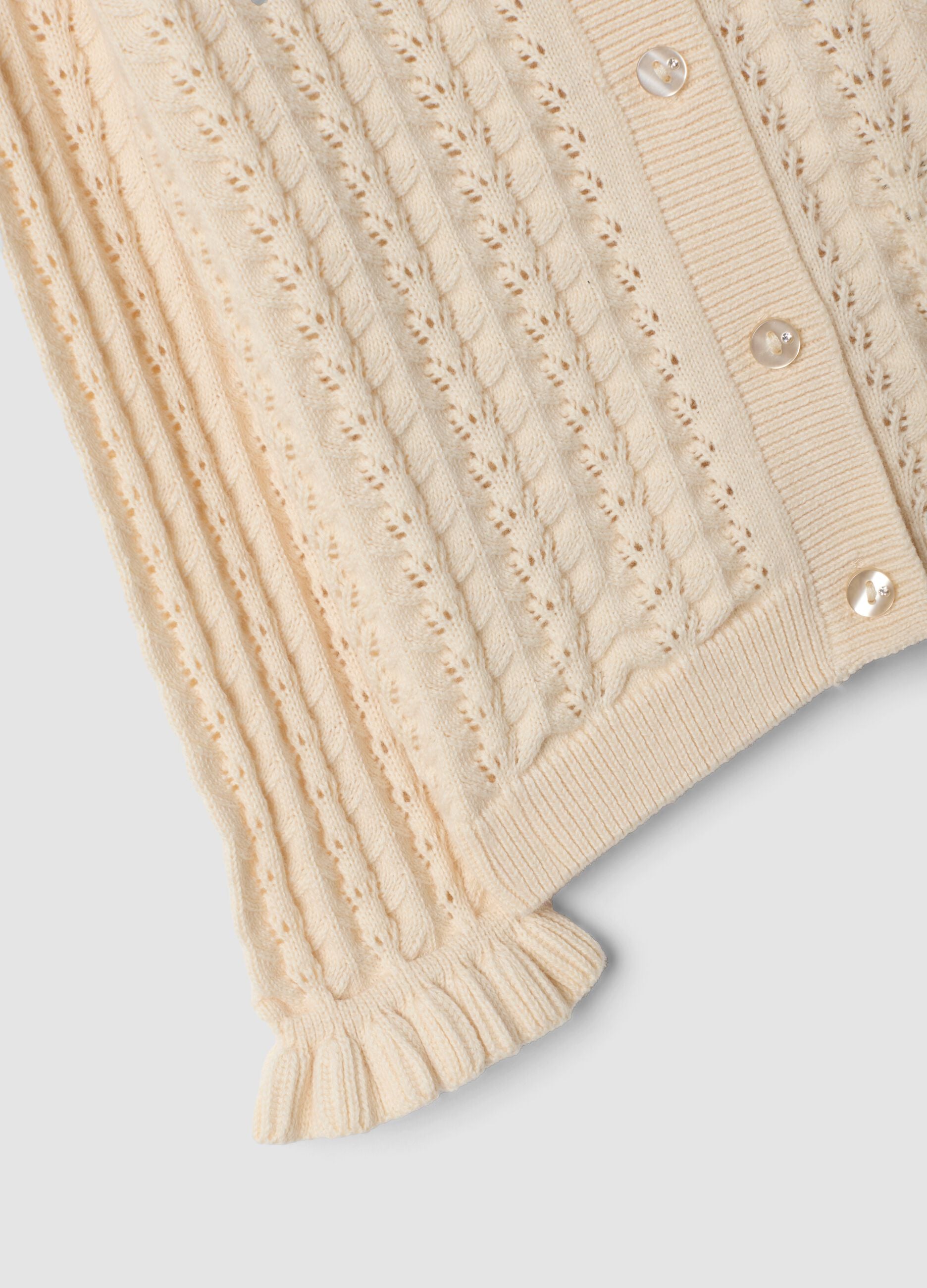 Cardigan beige in puro cotone a maglia traforata per bimba