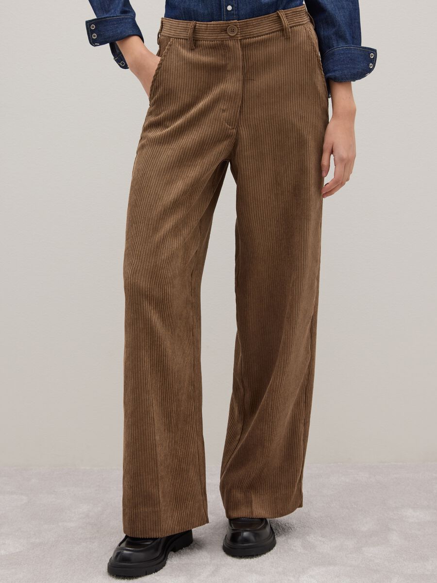 Brown regular fit textured stretch fabric trousers_1