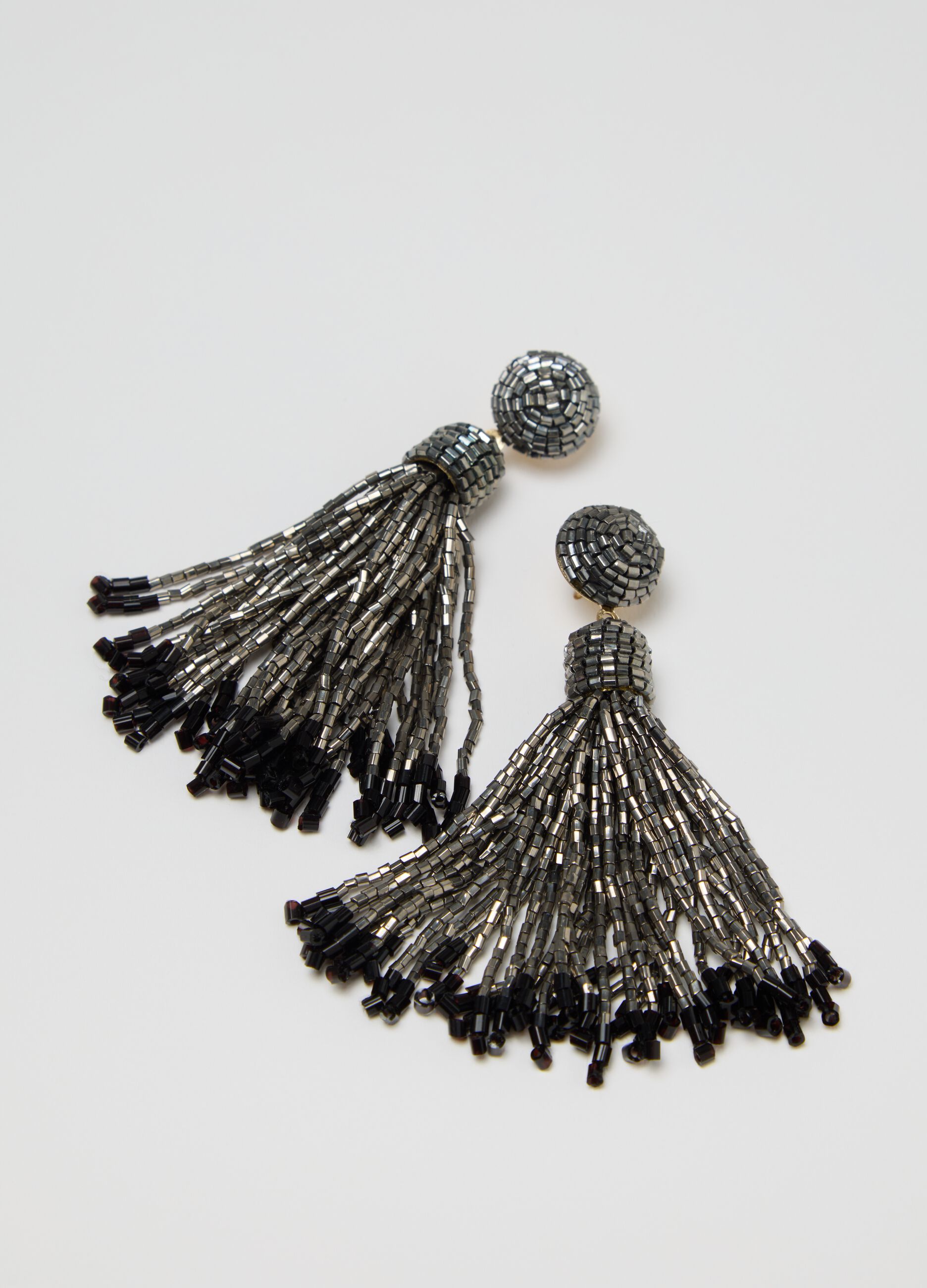 Grey pendant earrings with beads and fringing