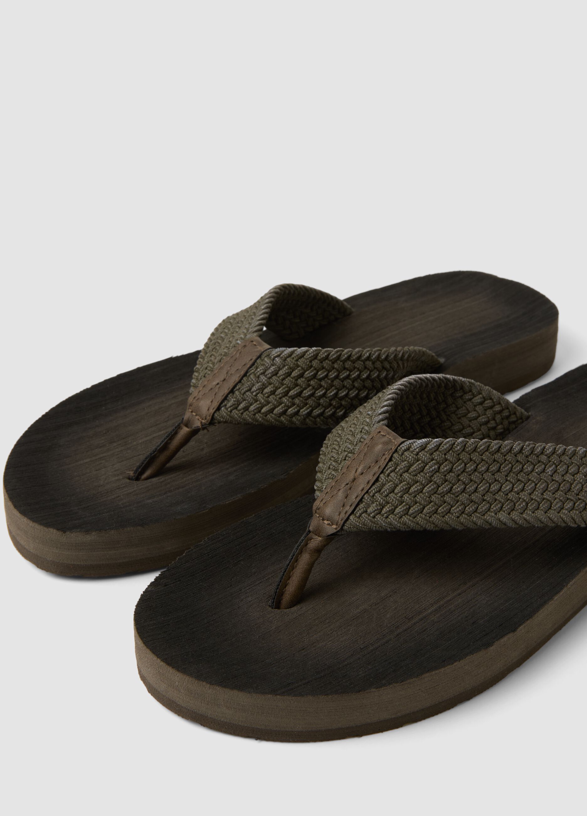 Green braided-strap flip-flops