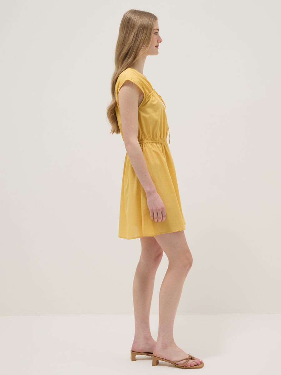 Yellow pure cotton regular-fit dress with V-neck and tie fastening_1