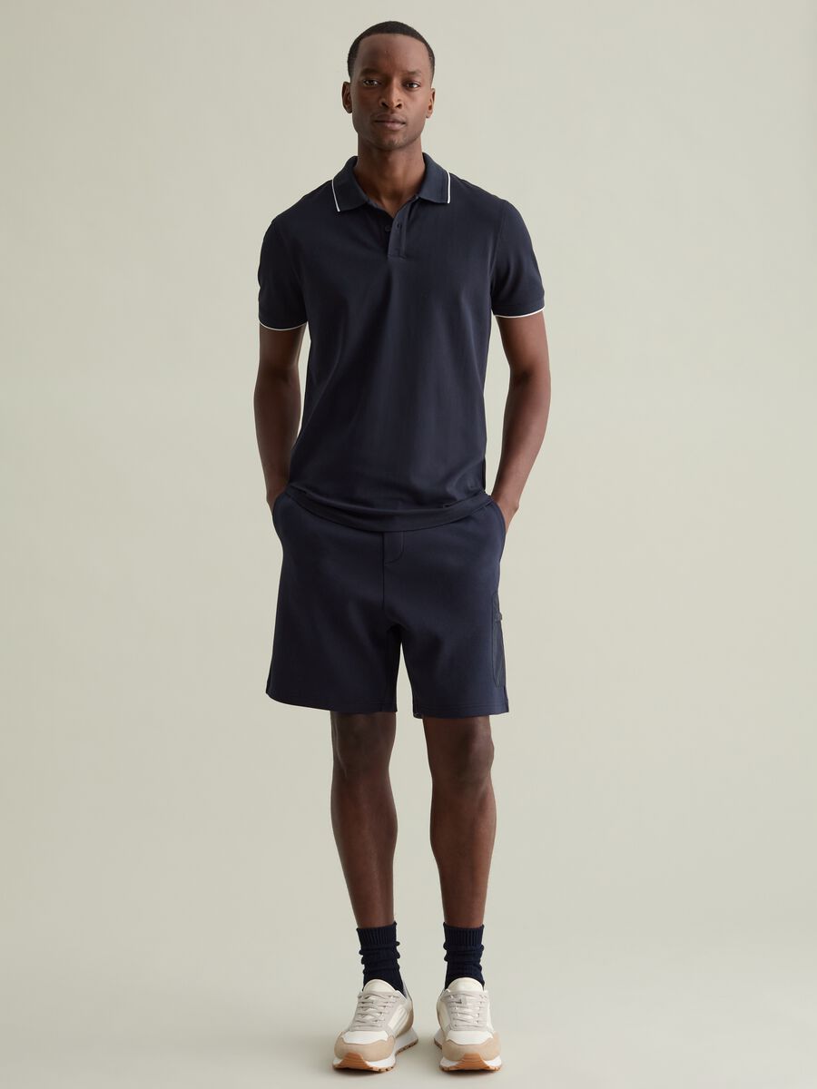 Polo shirt in technical fabric with contrasting edging_1