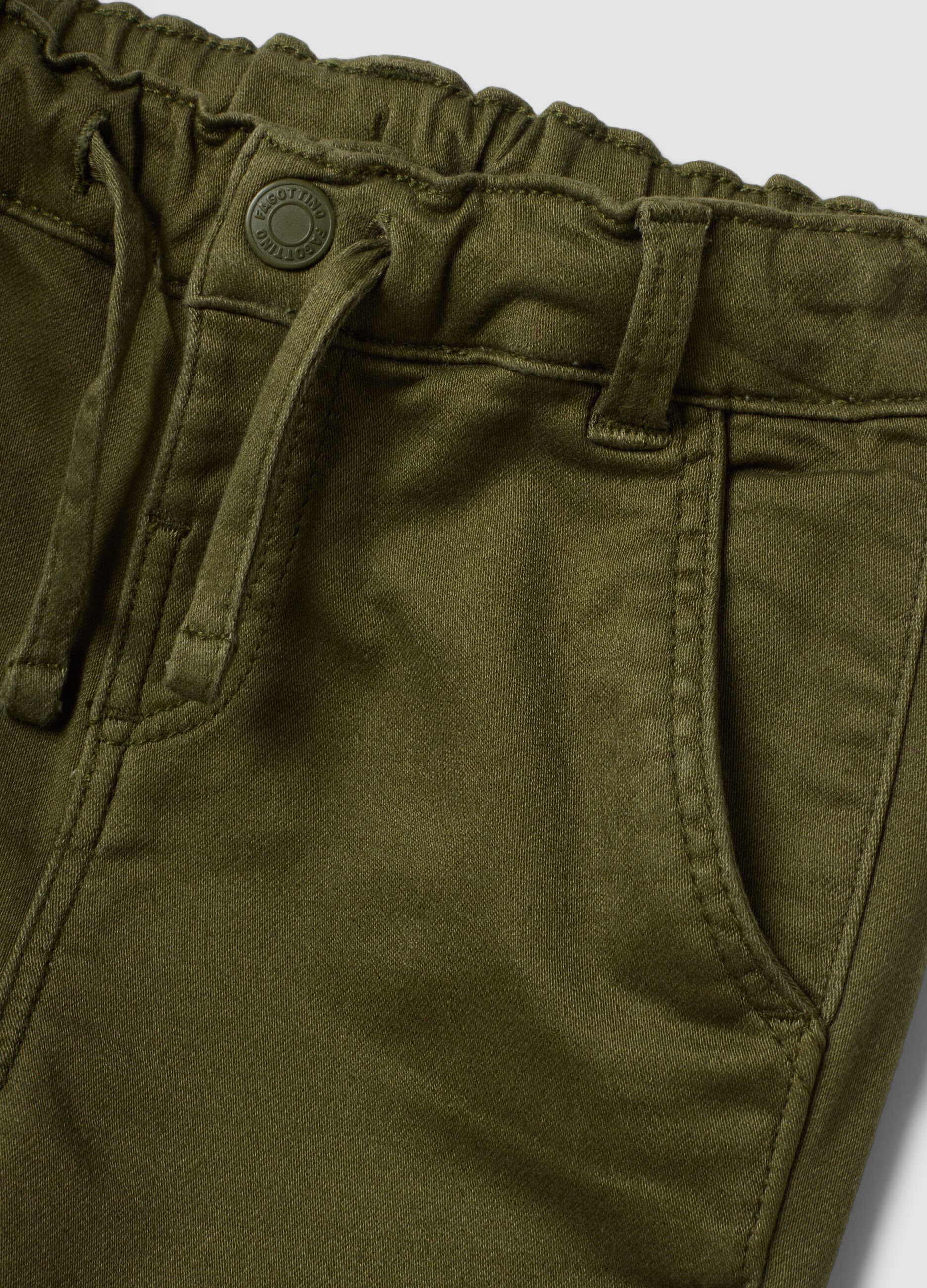 Green stretch cotton jogger trousers with drawstring, oversized fit for baby boy