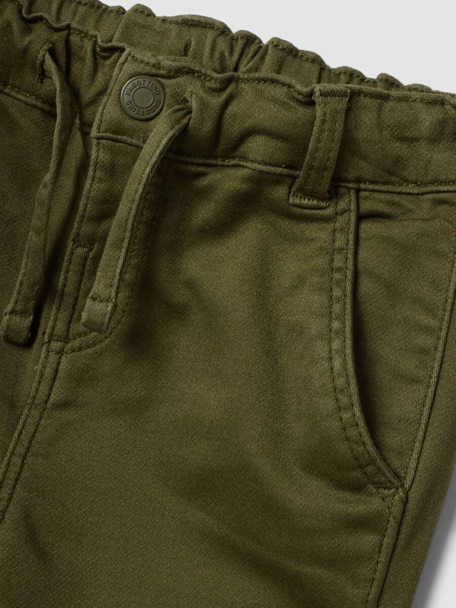 Green stretch cotton jogger trousers with drawstring, oversized fit for baby boy_2