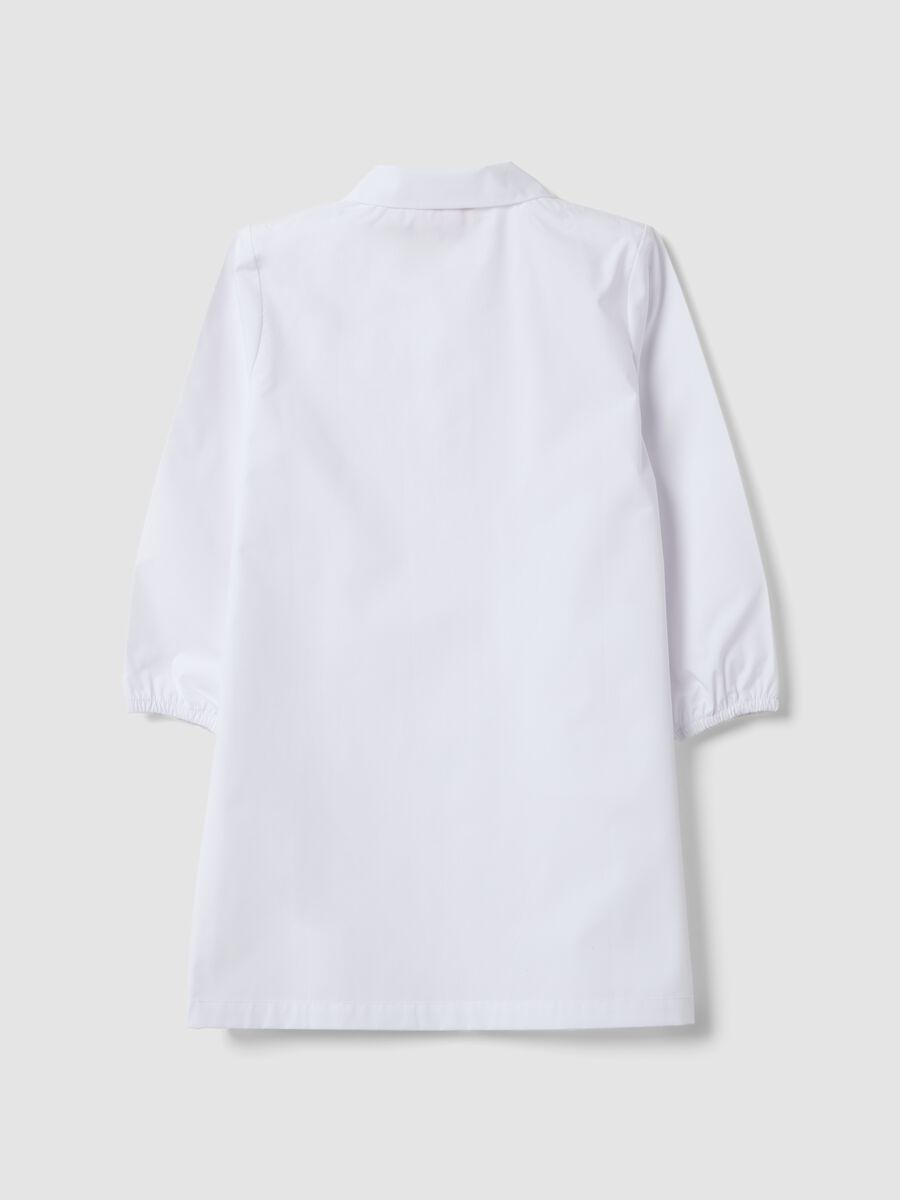 White nursery apron for boys with zip and Spidey embroidery_1