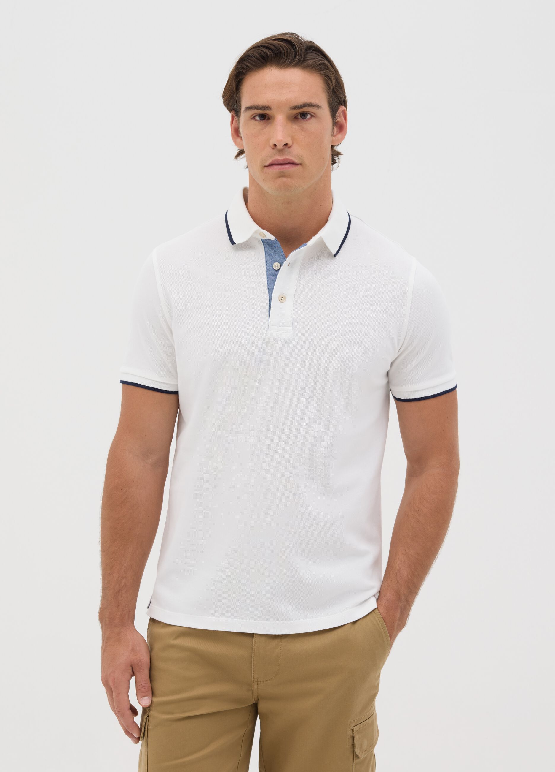 White polo shirt with short sleeves in cotton