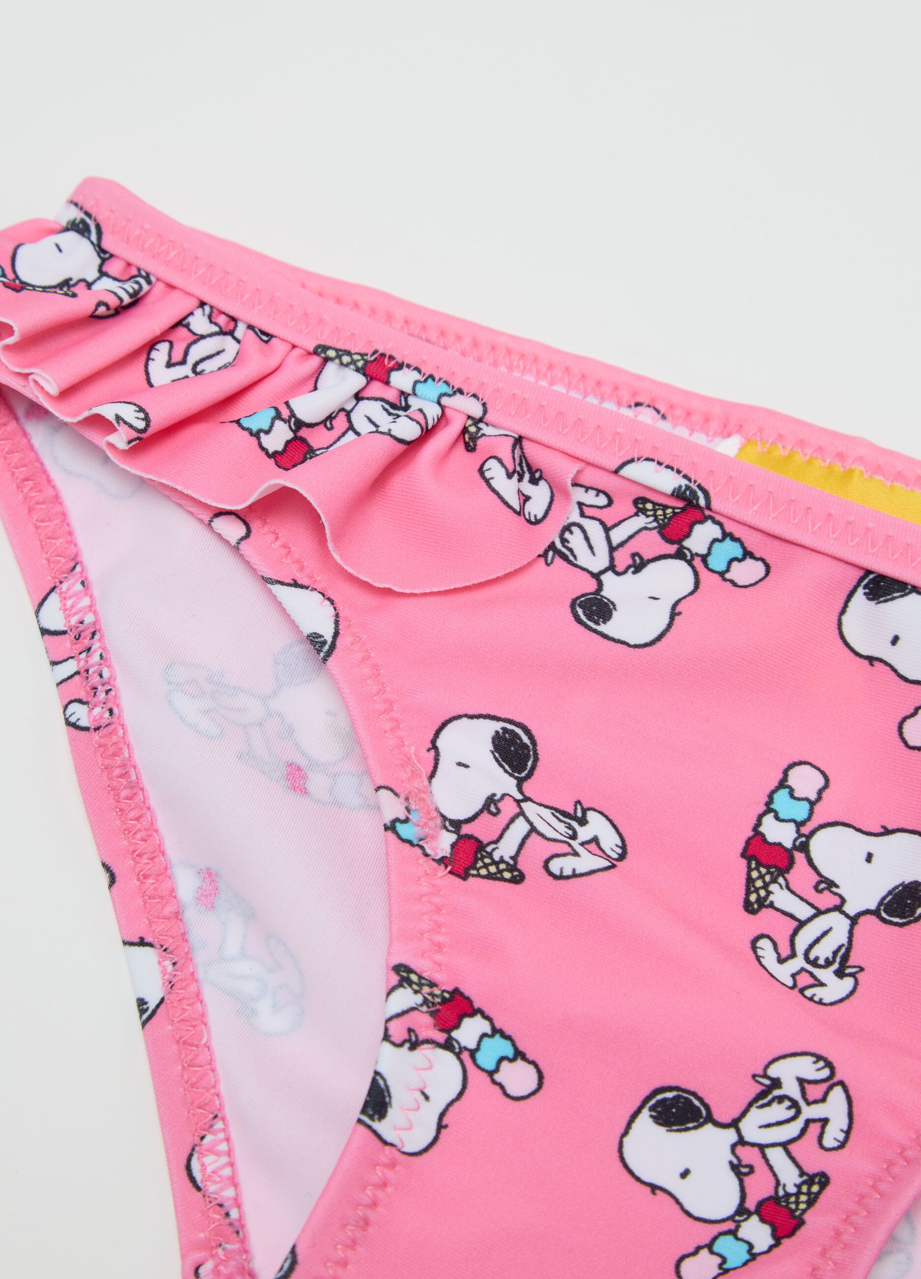Girls’ swimsuit in stretch pink fabric with Snoopy print