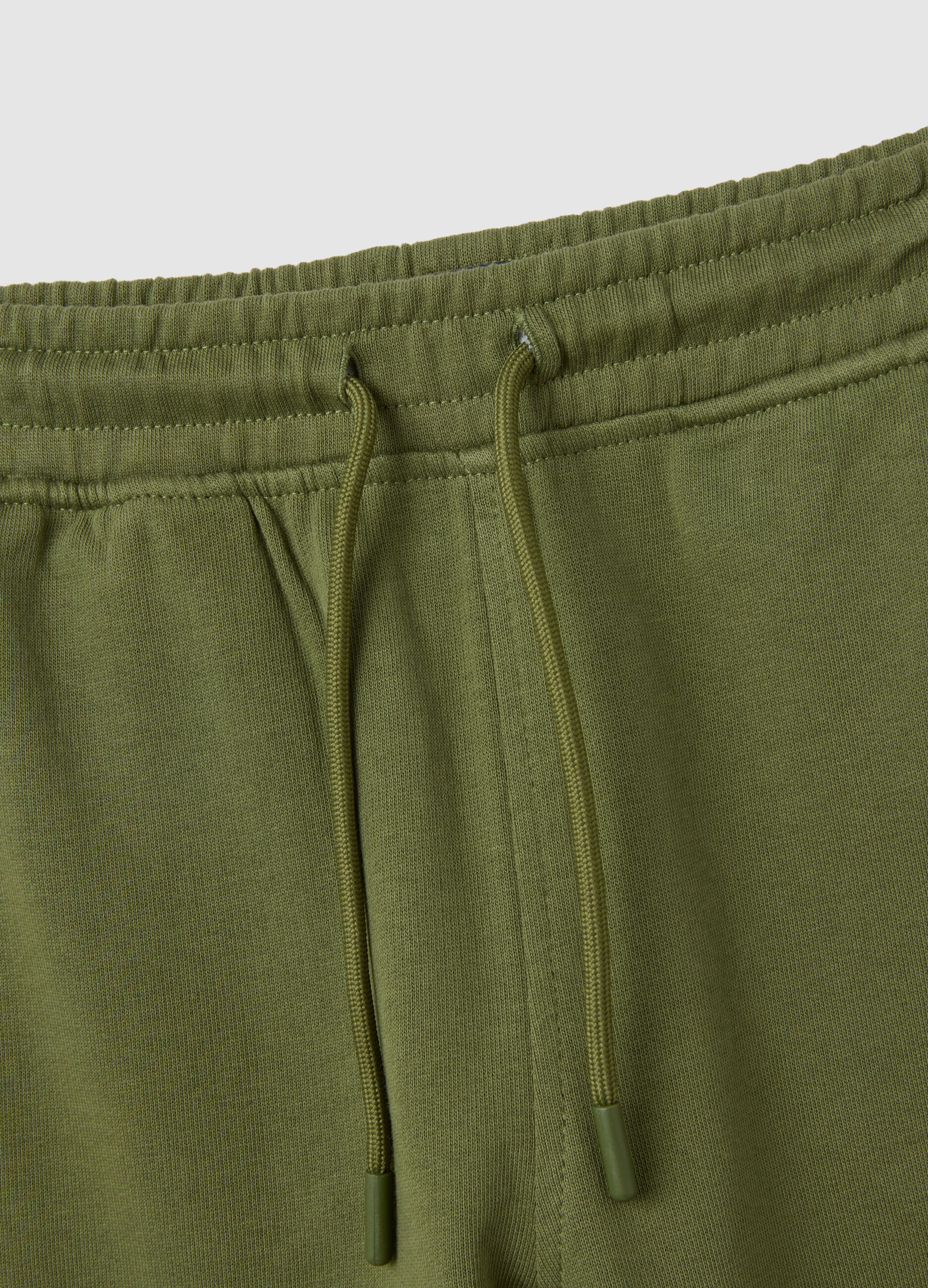 Children's green regular fit jogger trousers in pure cotton