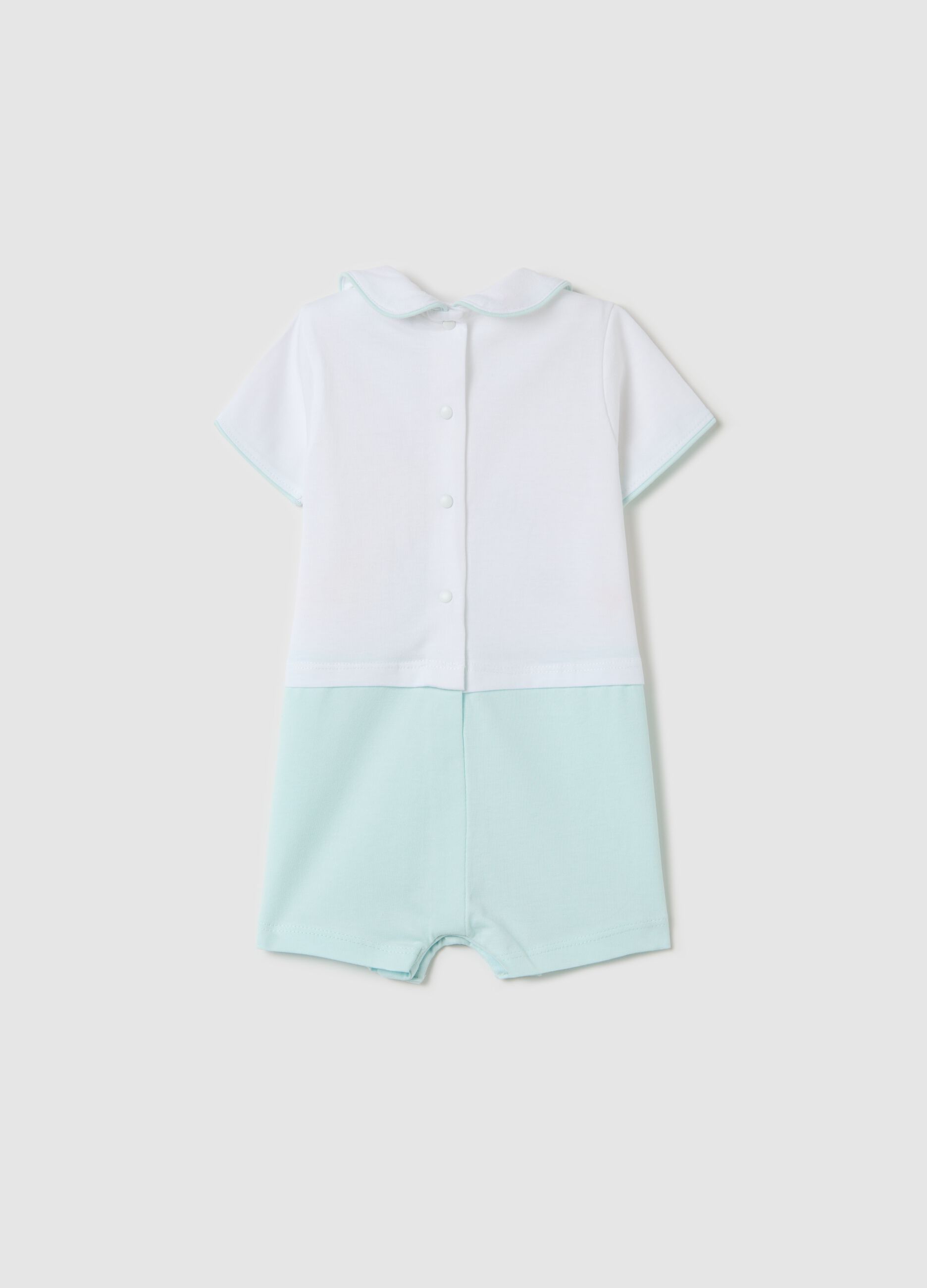 White and light blue romper suit in cotton with print
