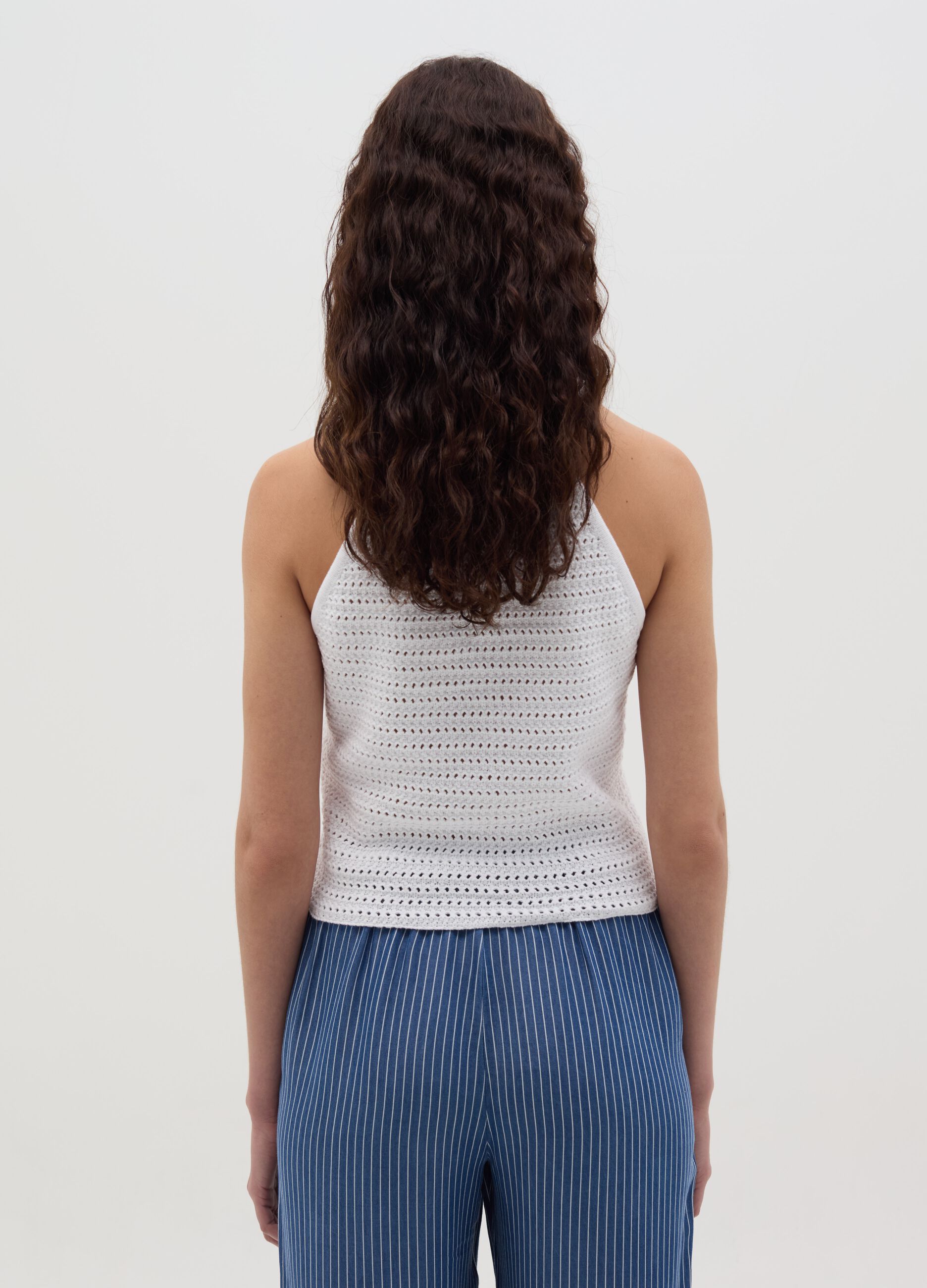 White openwork top with halter neck