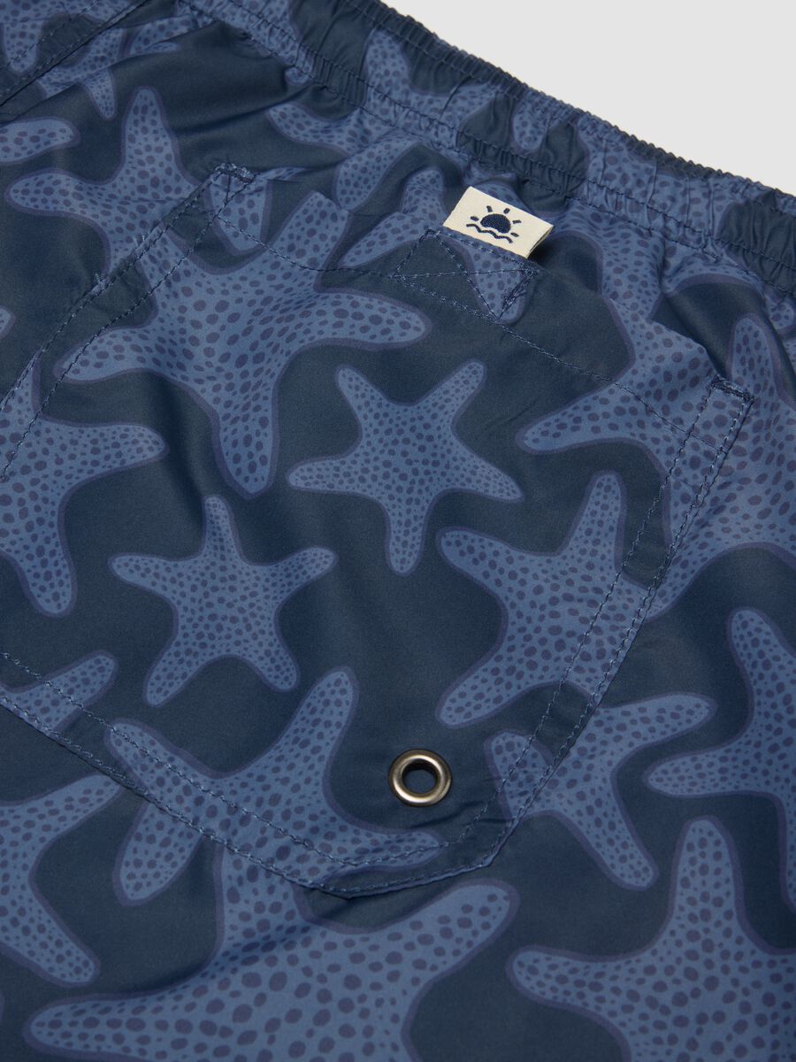 Blue swim shorts with starfish print_1