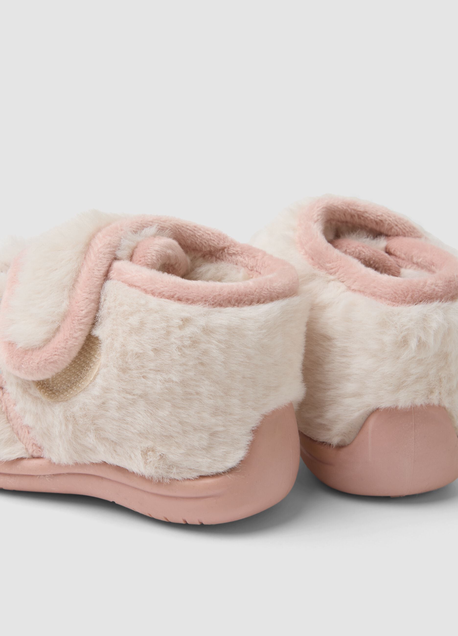 Pink animal motif slippers for baby girls and toddlers