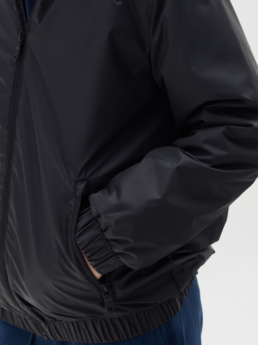 Giubbotto da ragazzo in nero water repellent_2