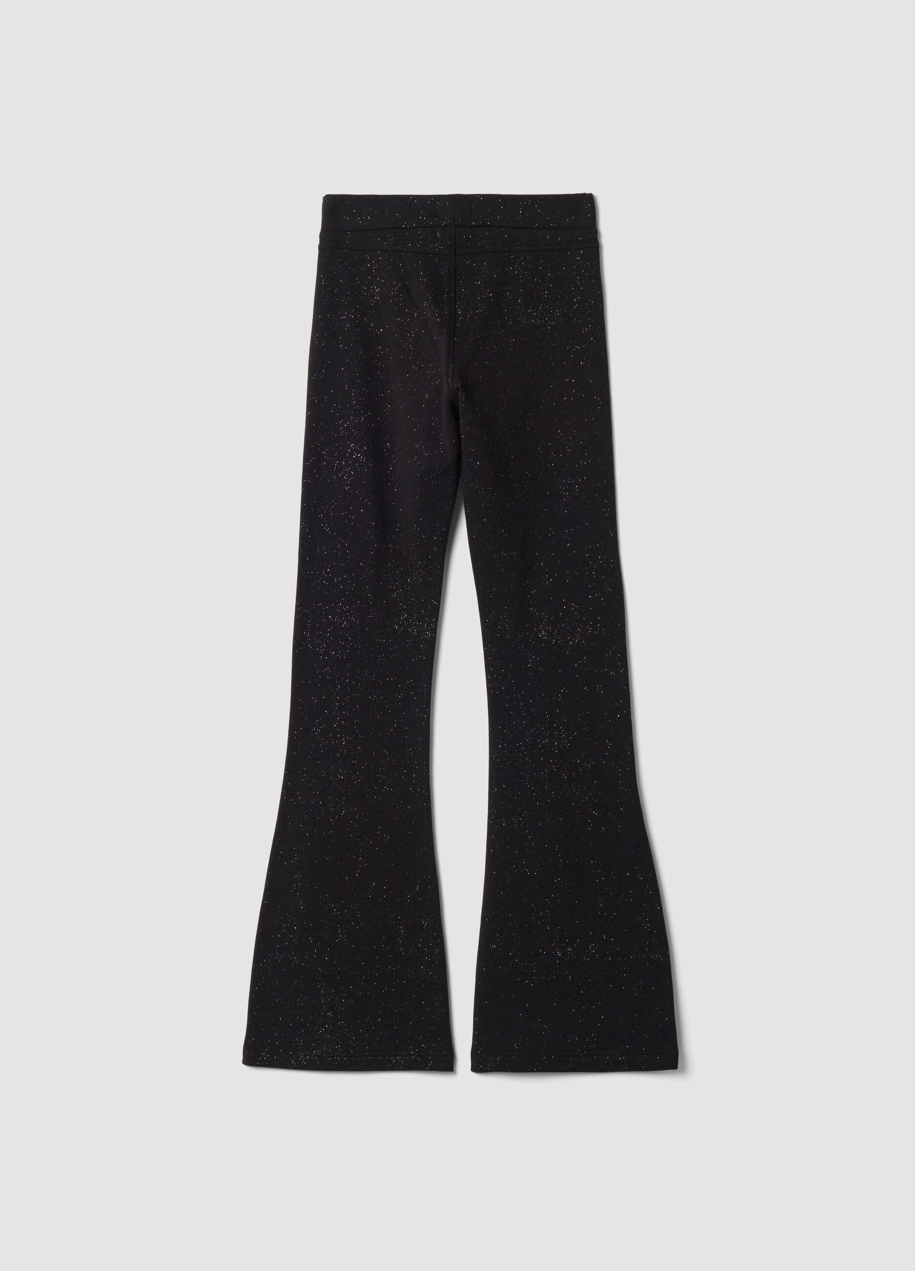 Pantaloni flare neri in cotone elasticizzato con stampa glitterata