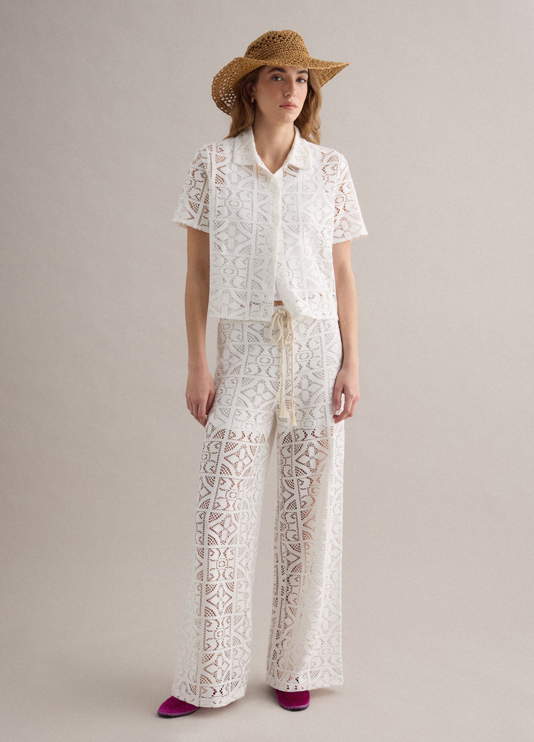 White openwork wide-leg trousers with elasticated waistband