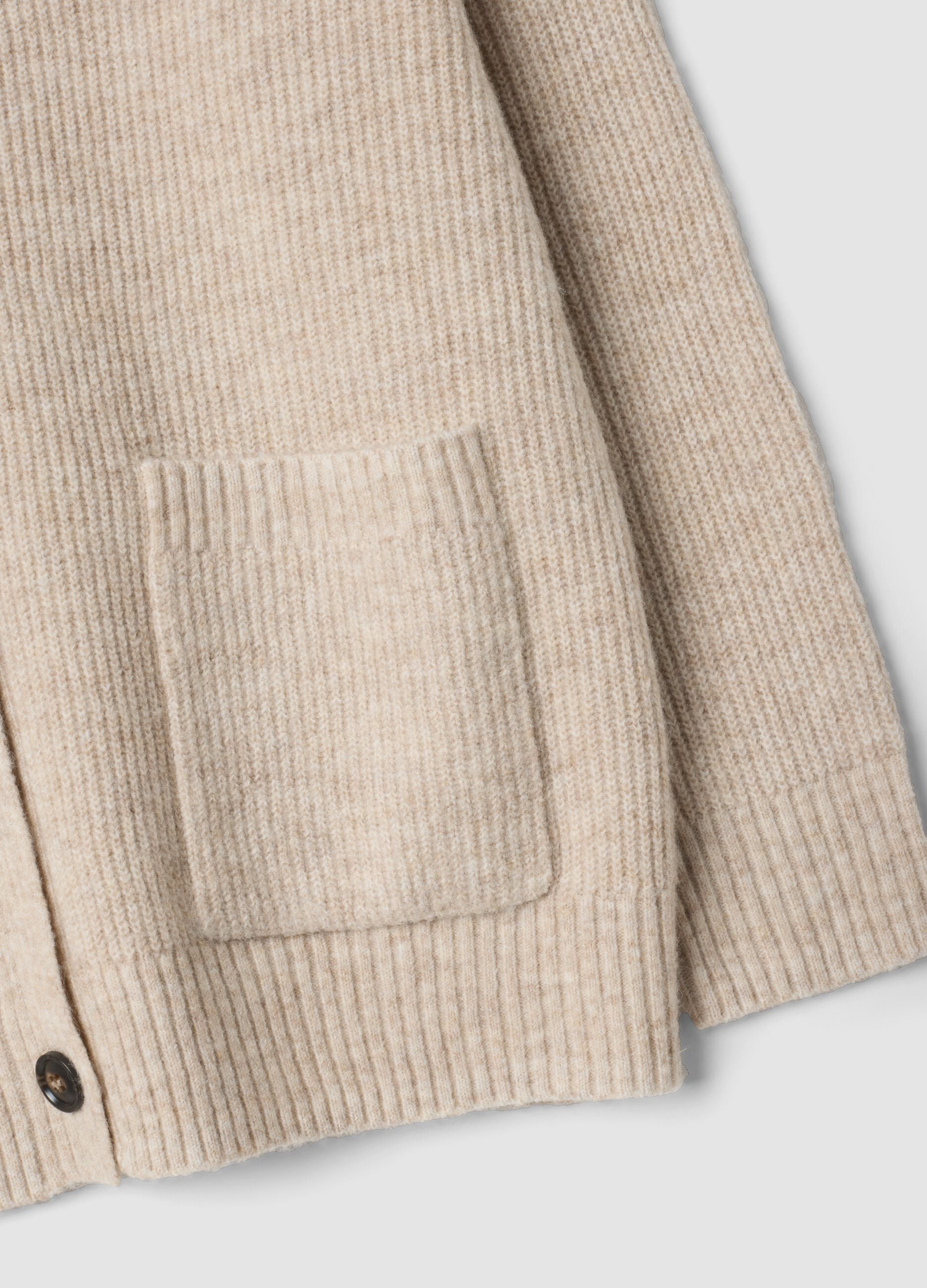 Beige stretch-fabric cardigan with deep V-neck