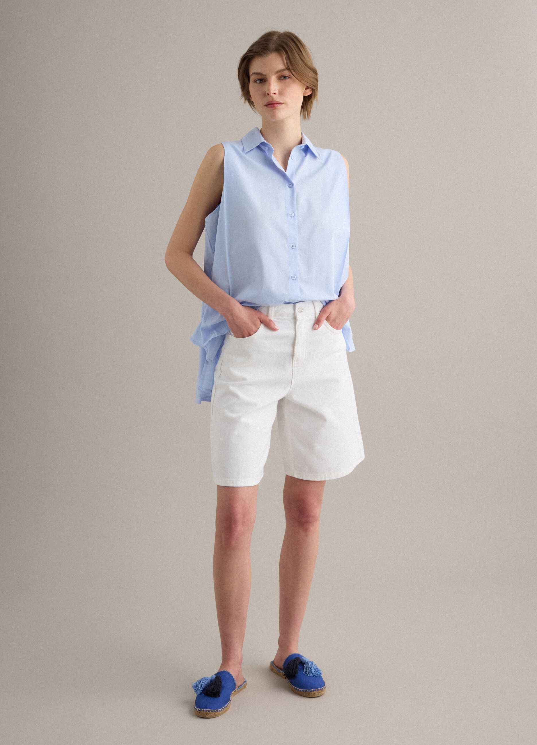 Blue mules with tassels