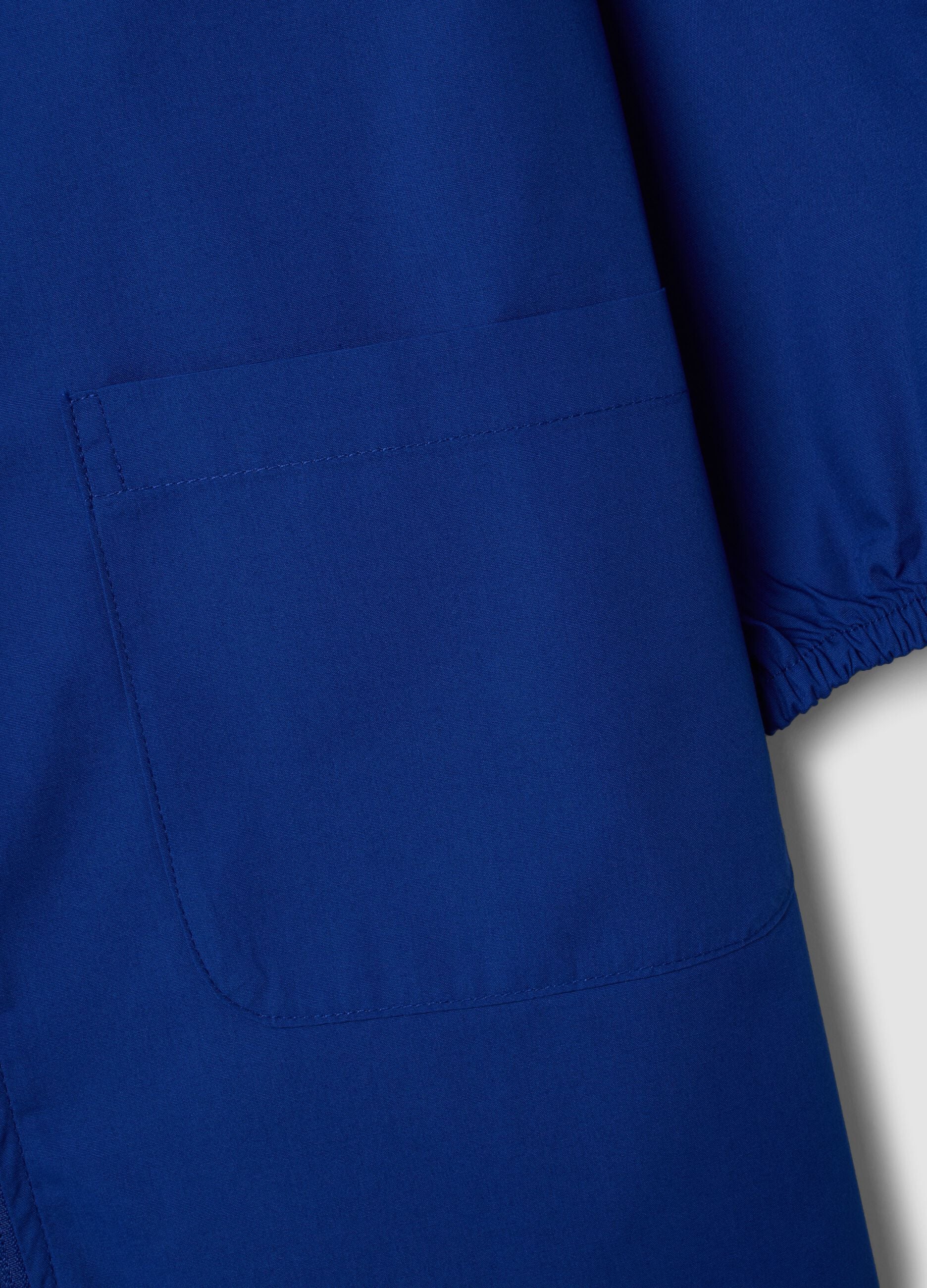 Blue girls&rsquo; school smock with kitten embroidery and classic collar