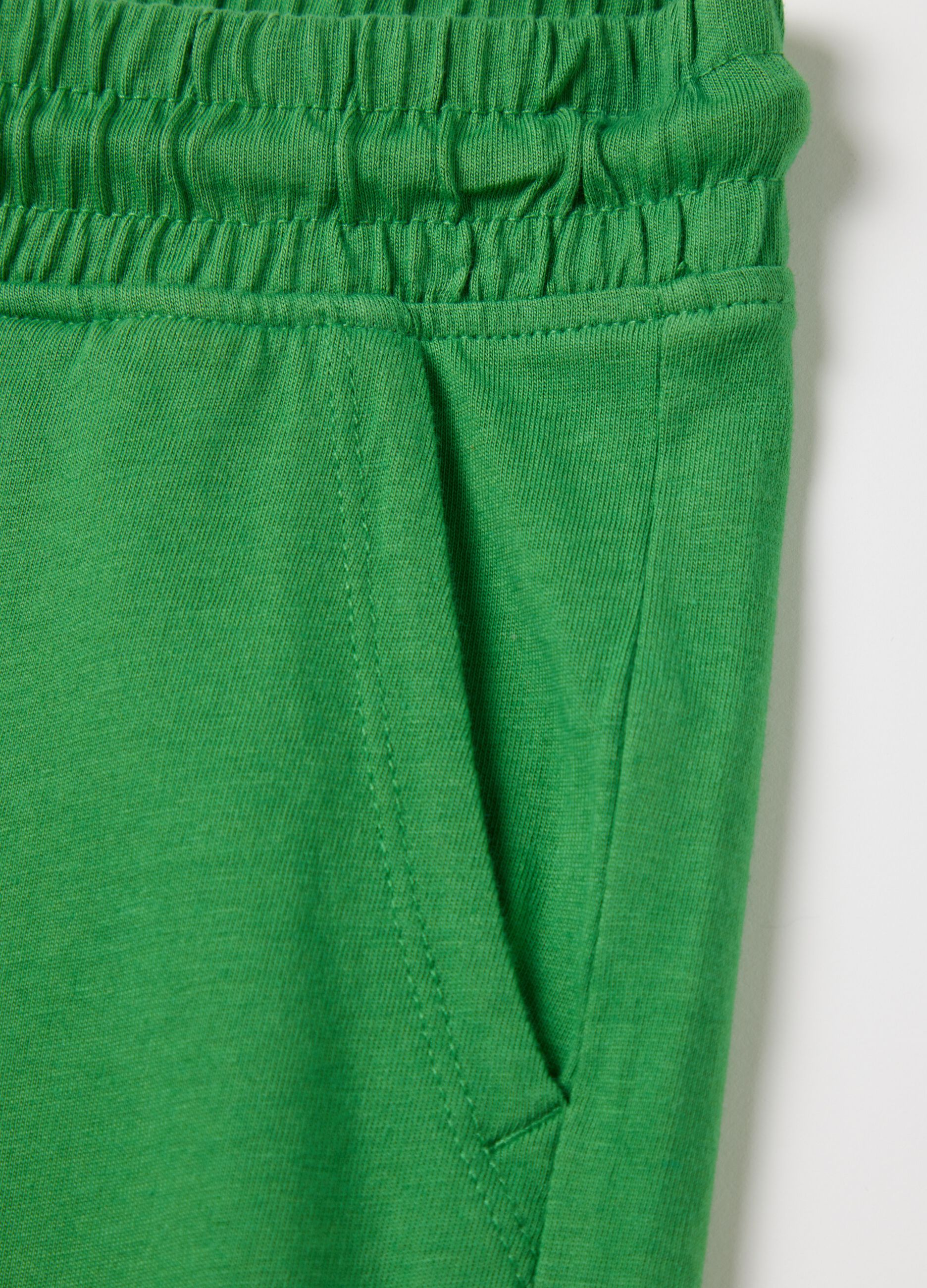 Green cotton shorts with elastic waistband