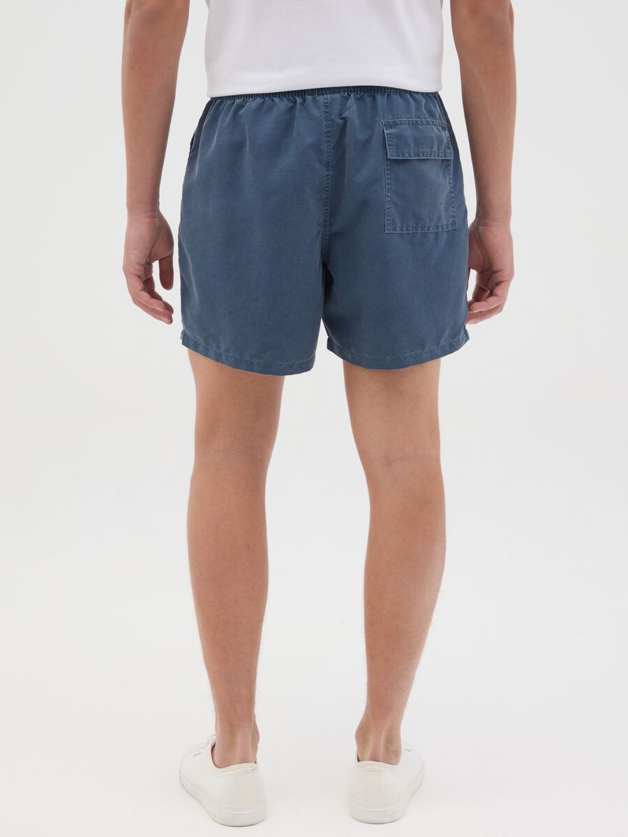 Blue swimming trunks with logo print_3