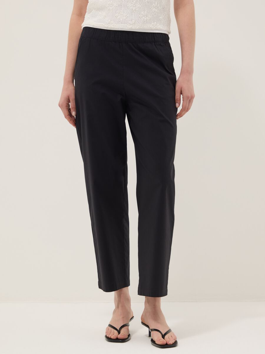 Pantaloni blu in cotone elasticizzato con vita elasticizzata_1