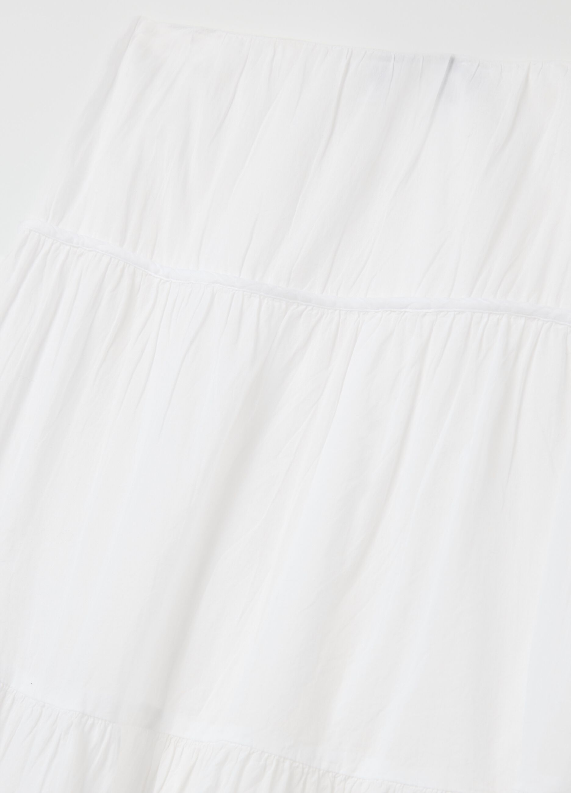Long white tiered skirt