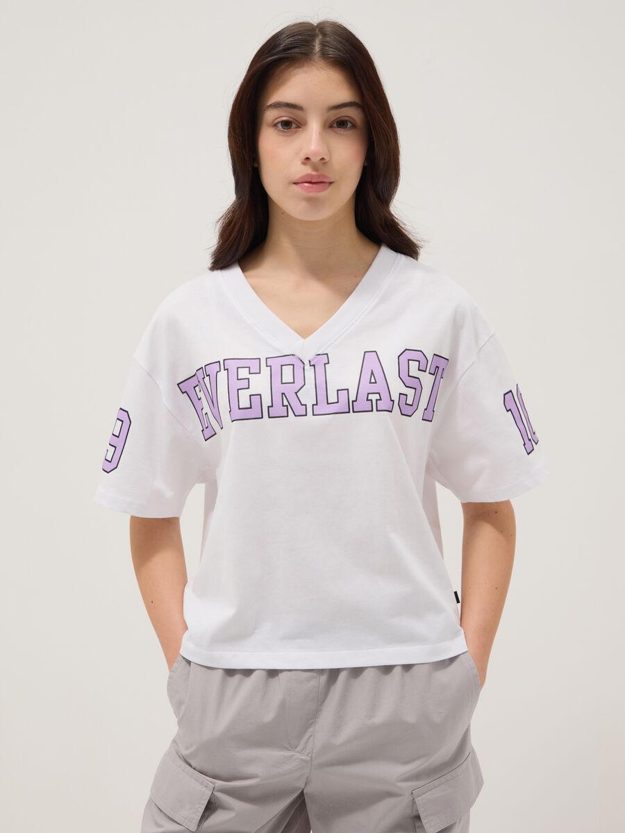 T-shirt bianca in puro cotone con scollo a V_0