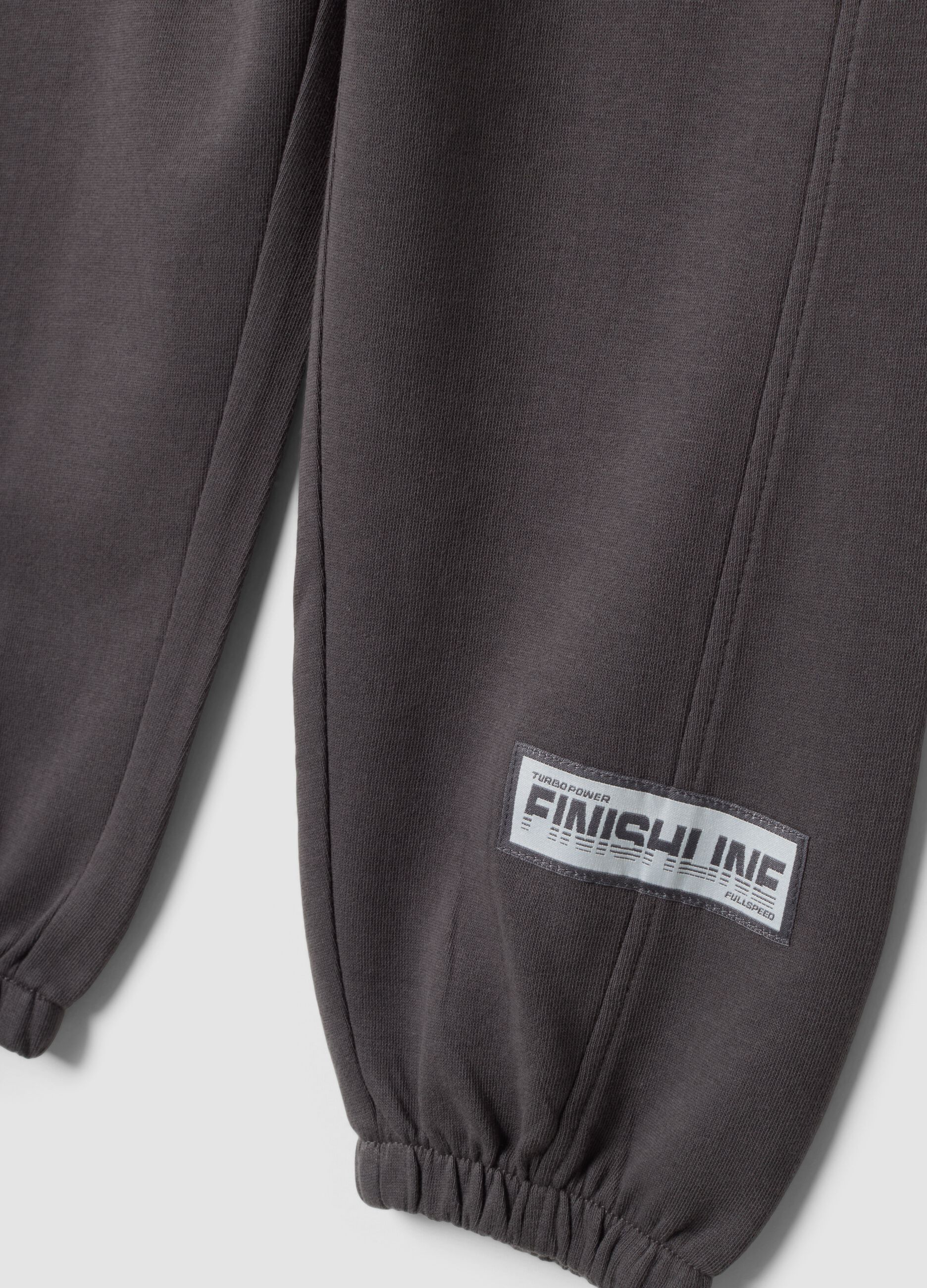 Pantaloni jogger grigi in puro cotone con fondo elastico