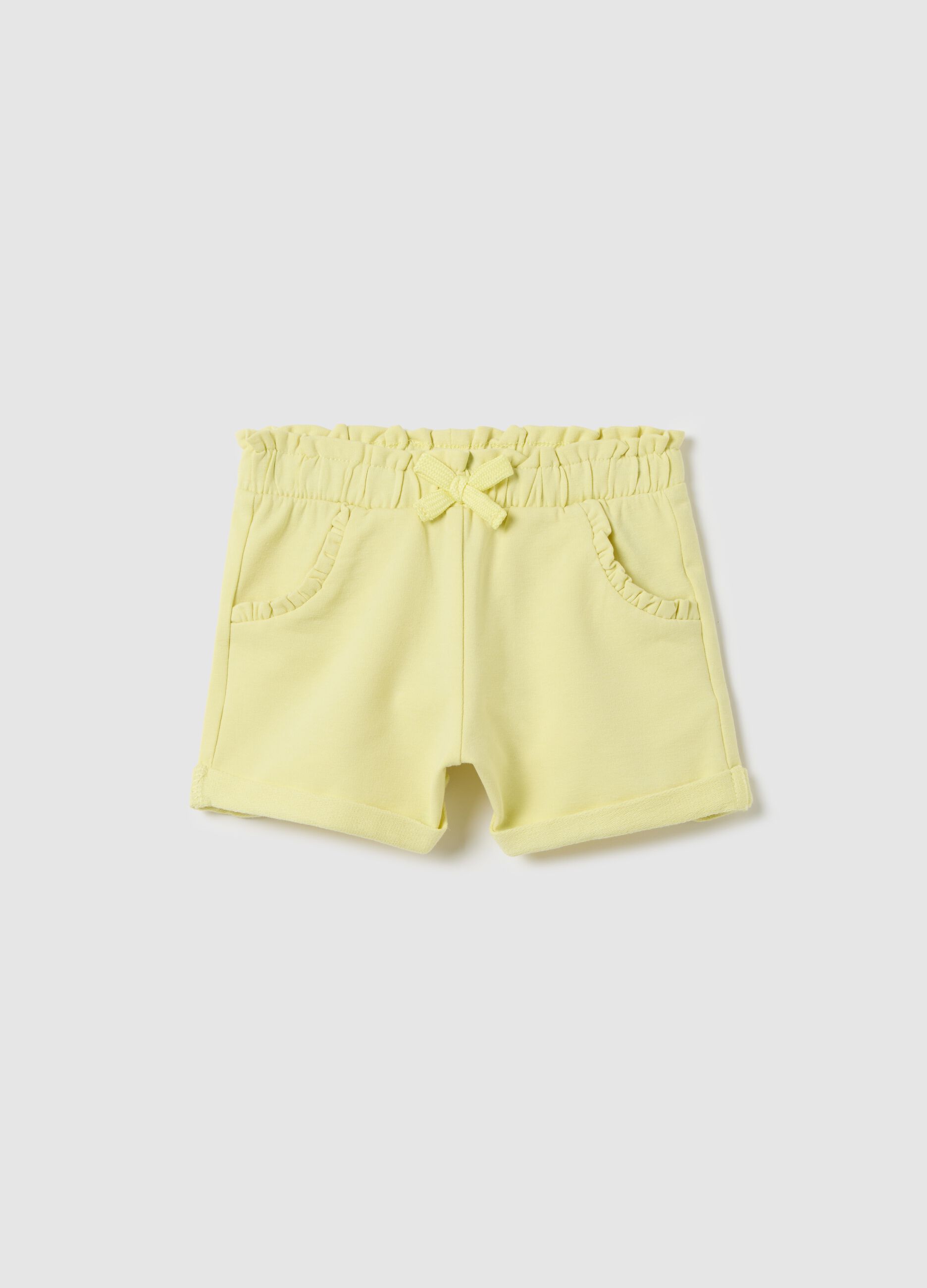 Yellow French terry shorts with bow and frills