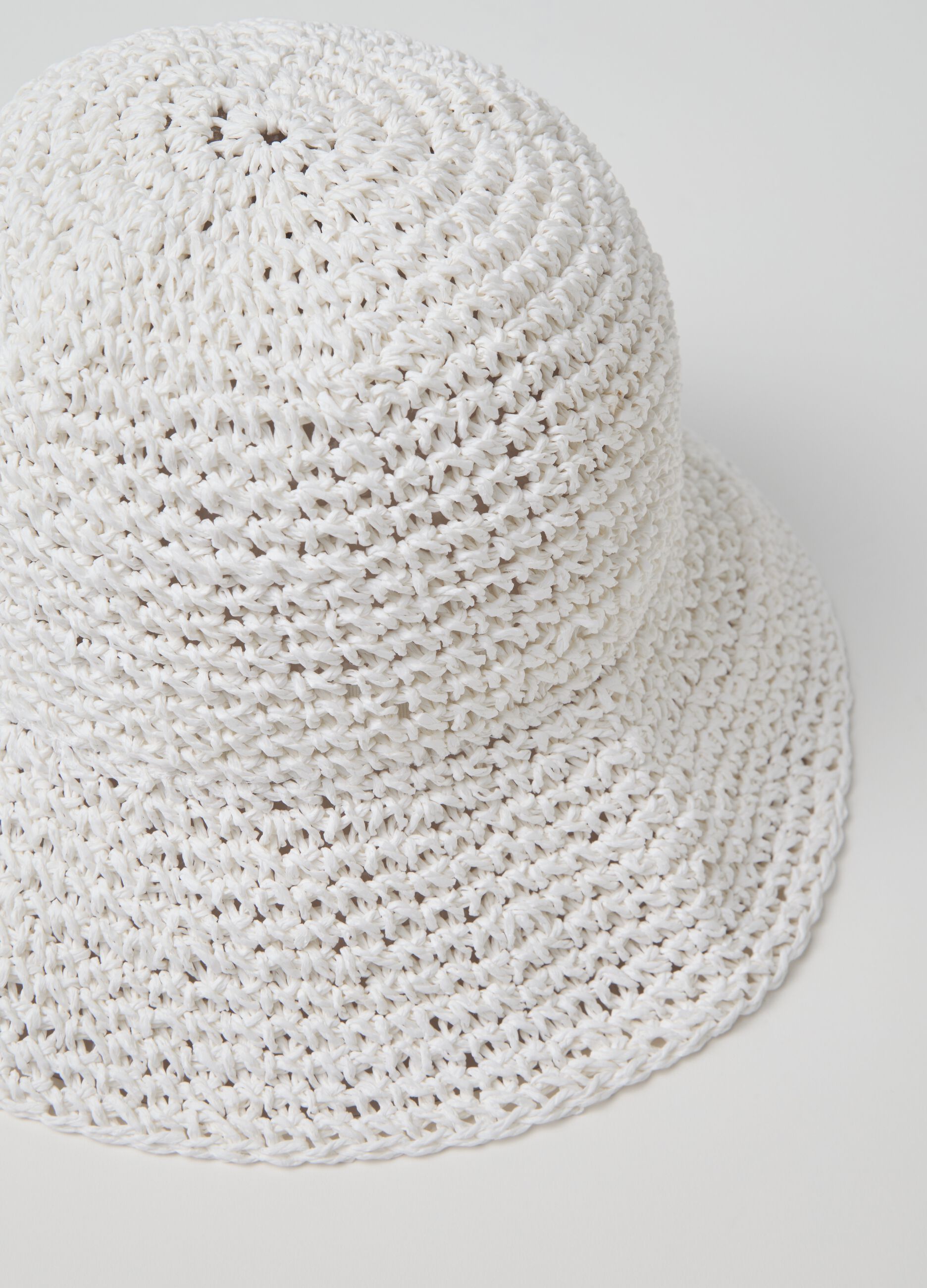 White cloche hat in woven straw