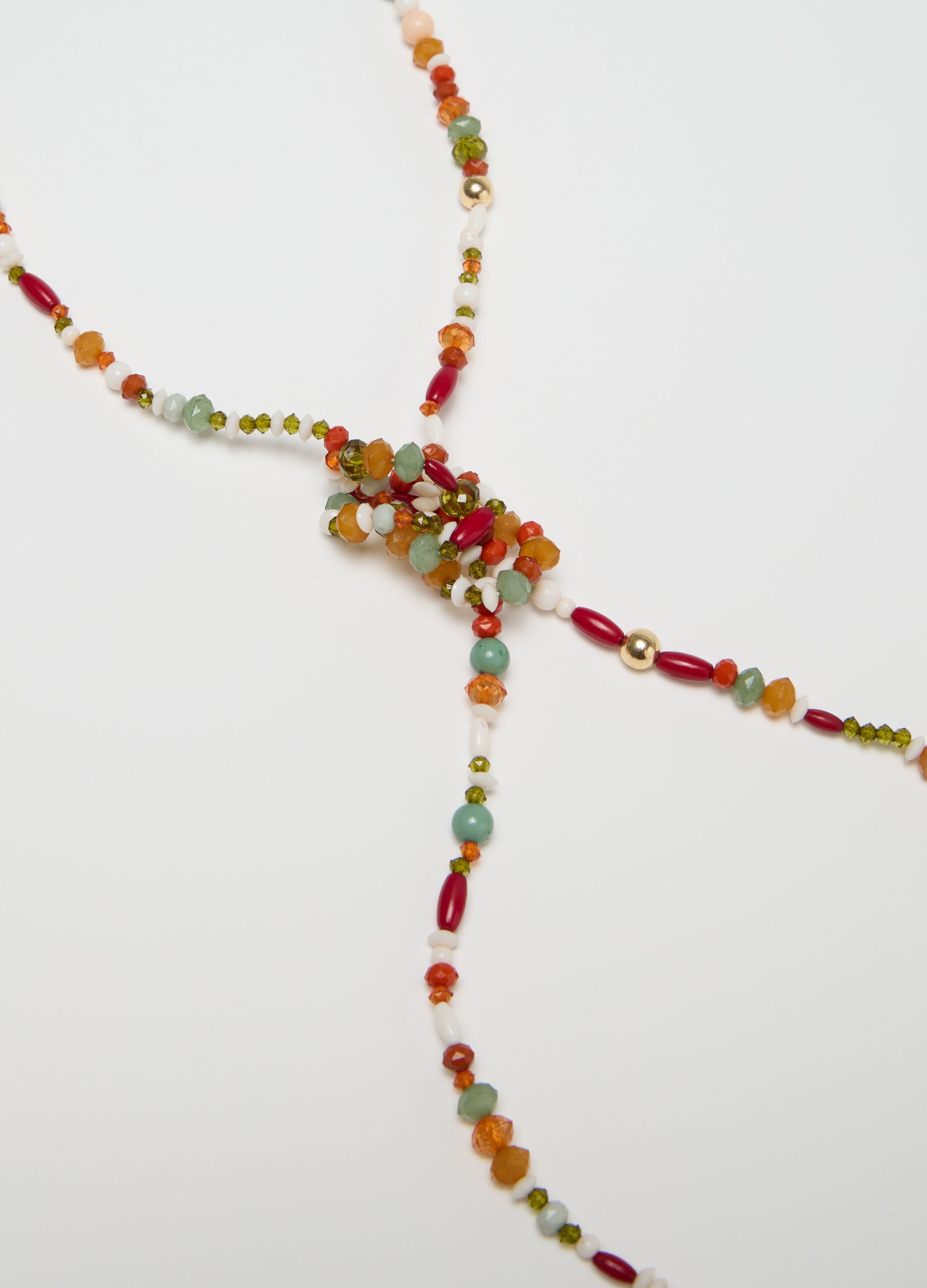 Long red and green necklace with stones