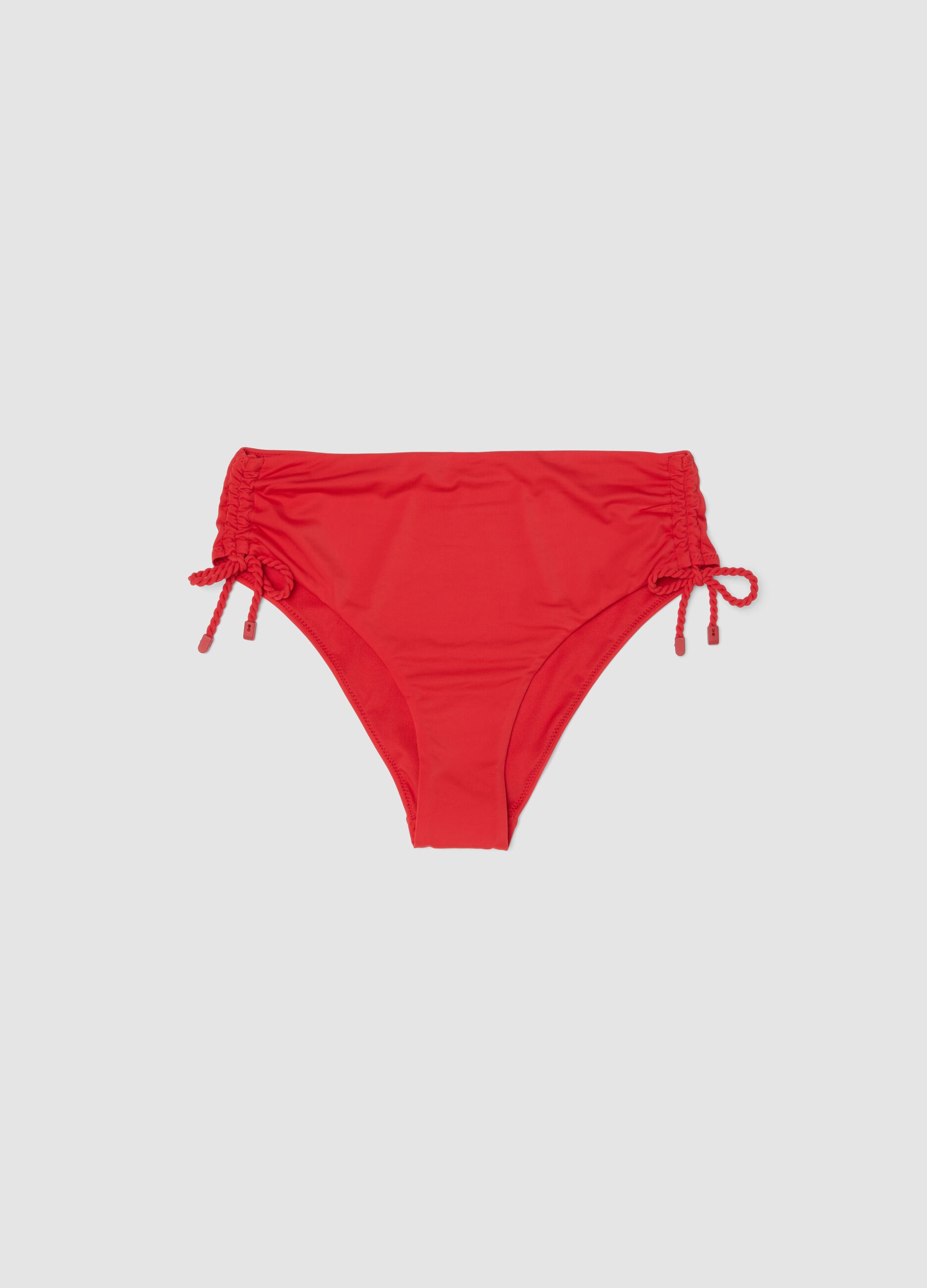 Slip bikini rossi in tessuto elasticizzato con laccetti laterali