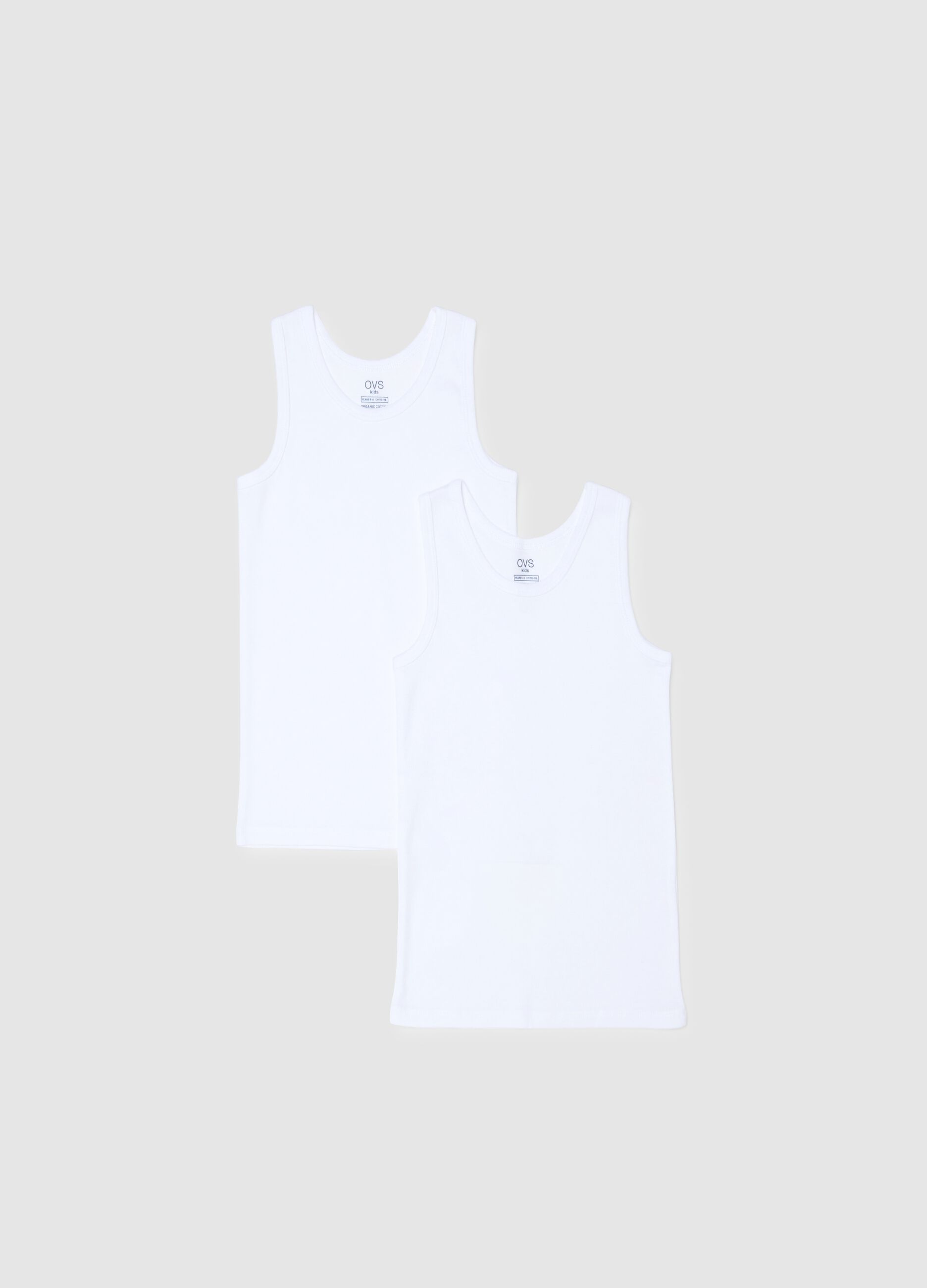 Pack of two boys' white cotton vests with a regular fit