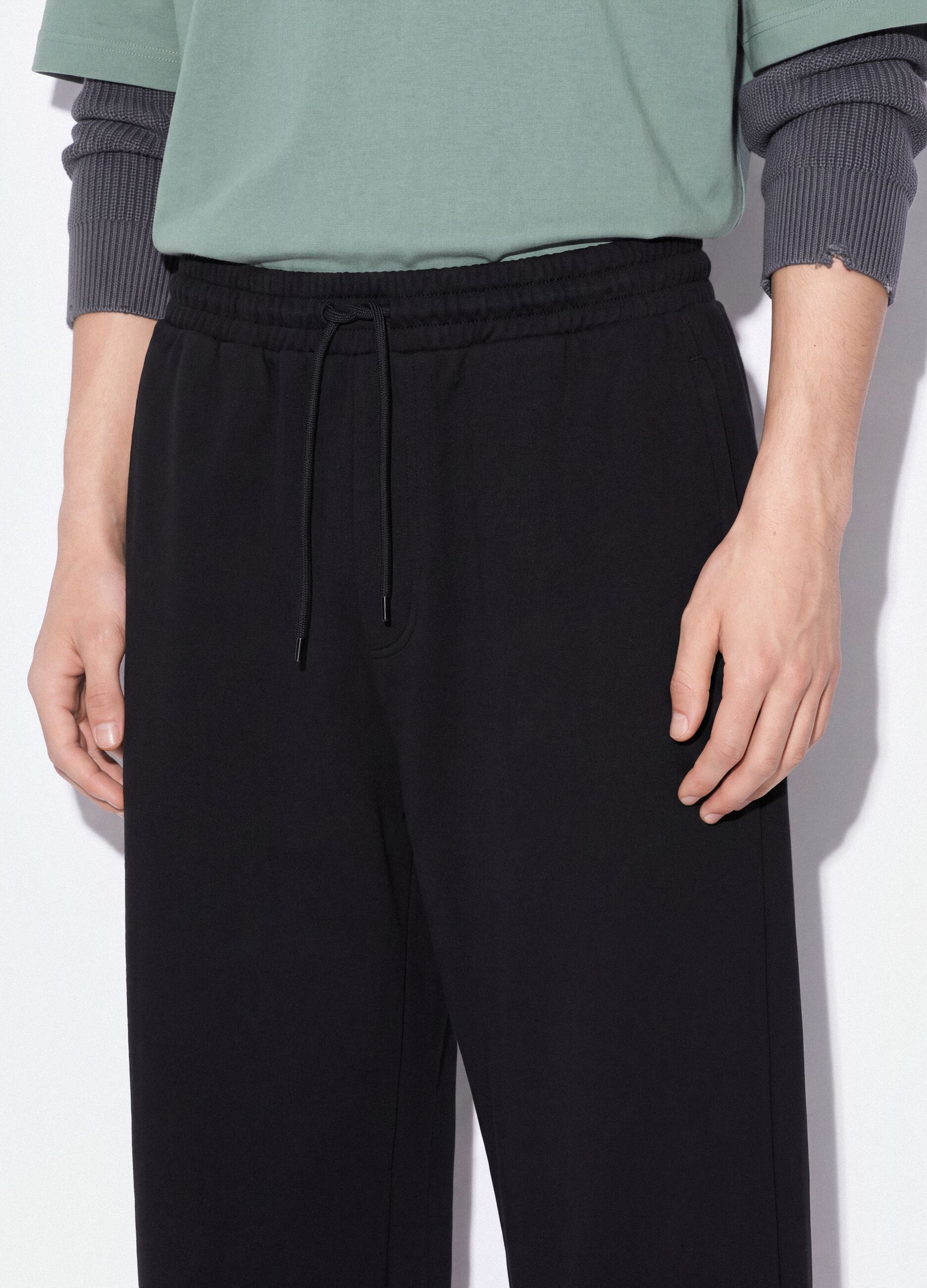 Black pure cotton joggers with elasticated waistband, oversized fit