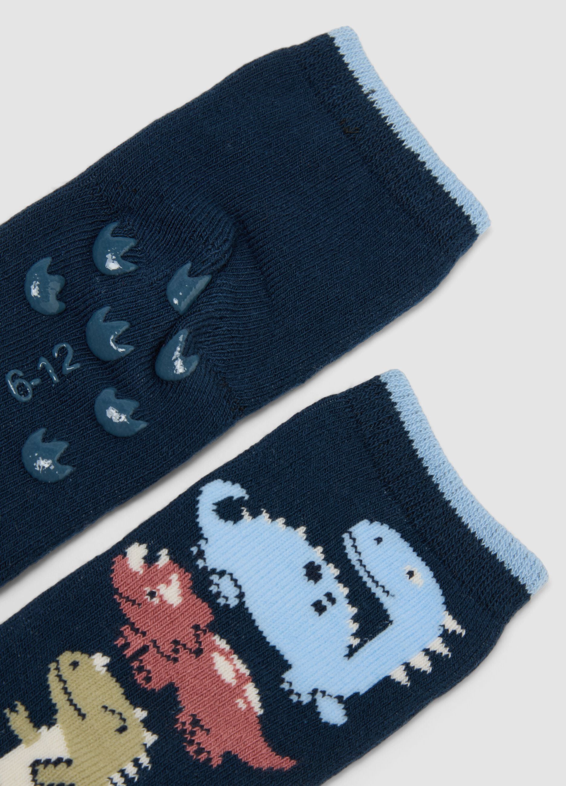 2-pack of blue non-slip socks in organic stretch cotton with dinosaur print
