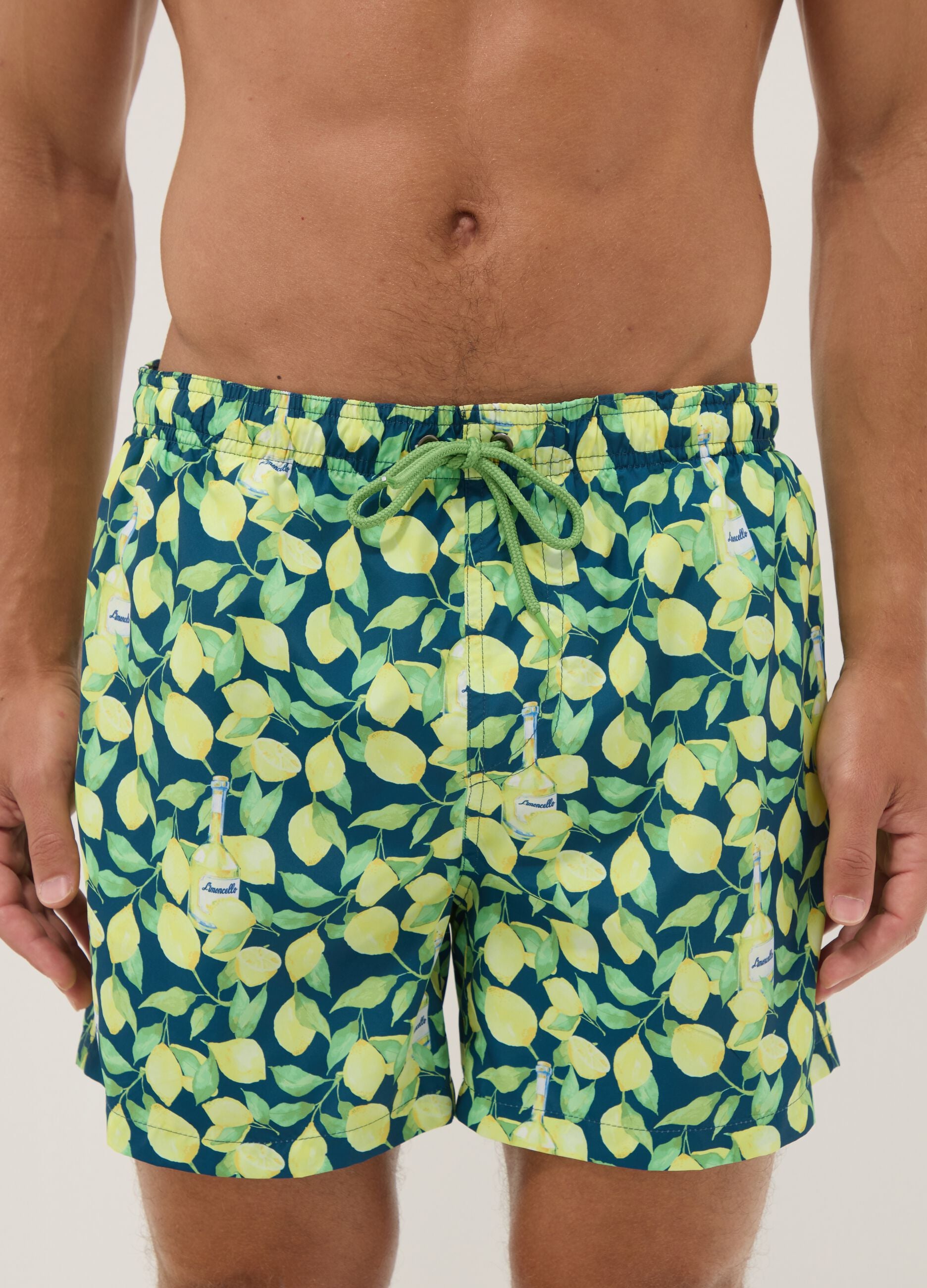 Blue boxer swim shorts with Limoncello print