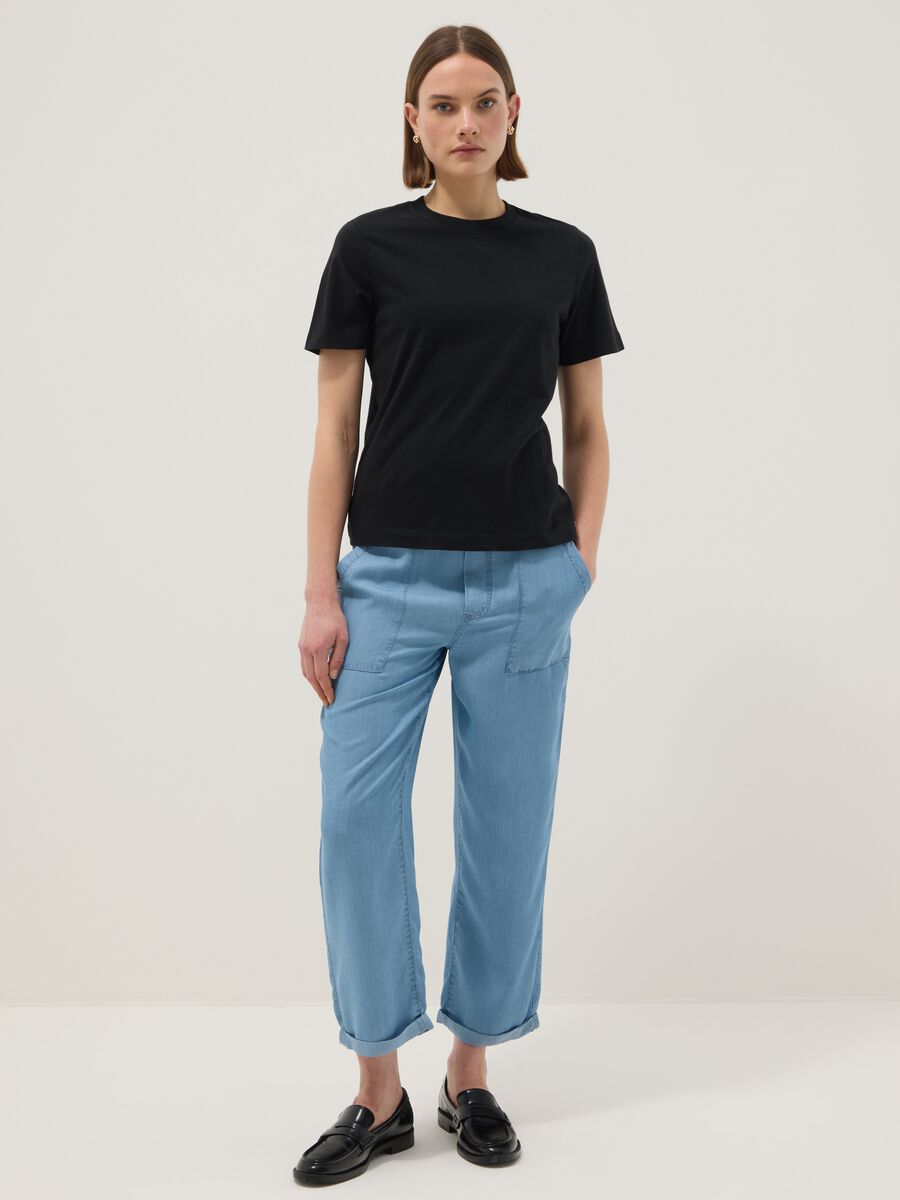 Light blue denim jeans in pure lyocell with elasticated waist, relaxed fit_0