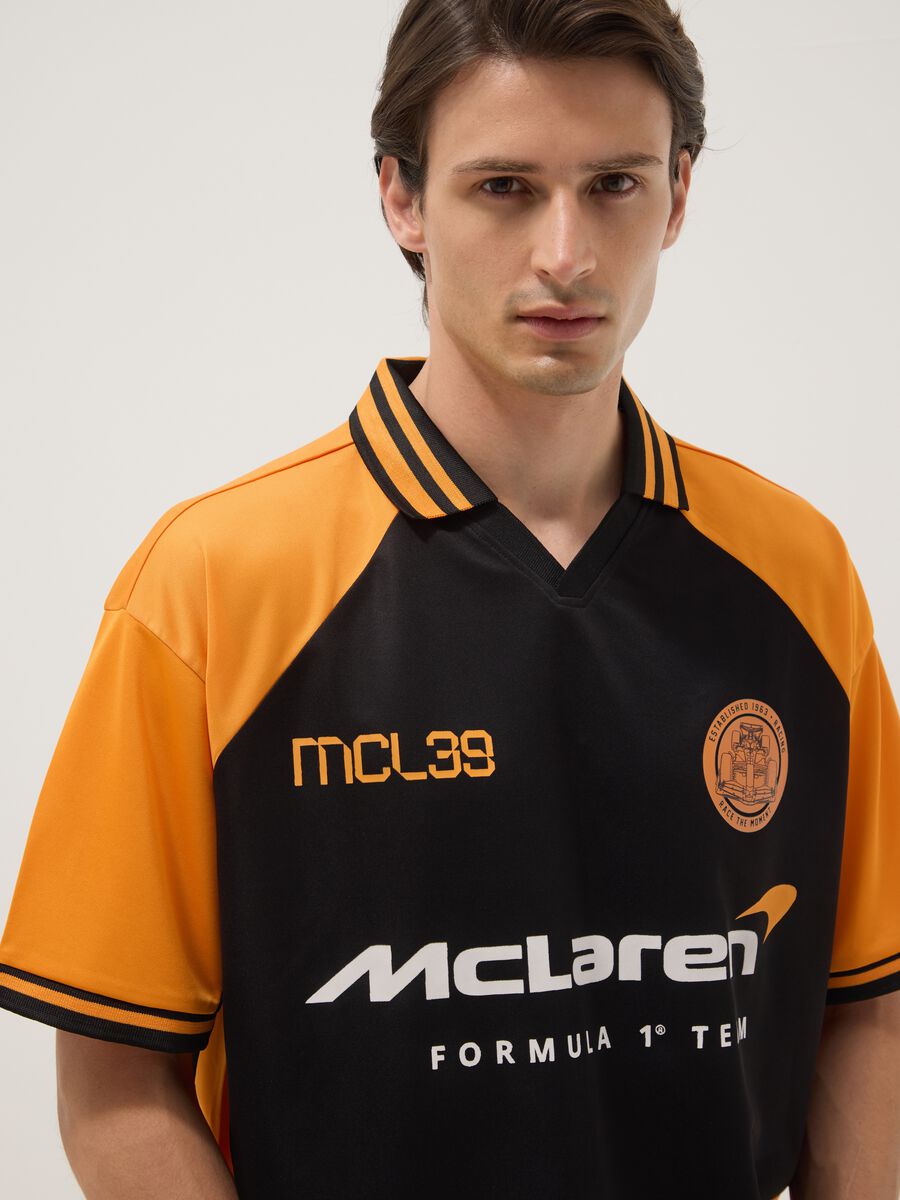 Black and orange oversized McLaren logo polo shirt_2