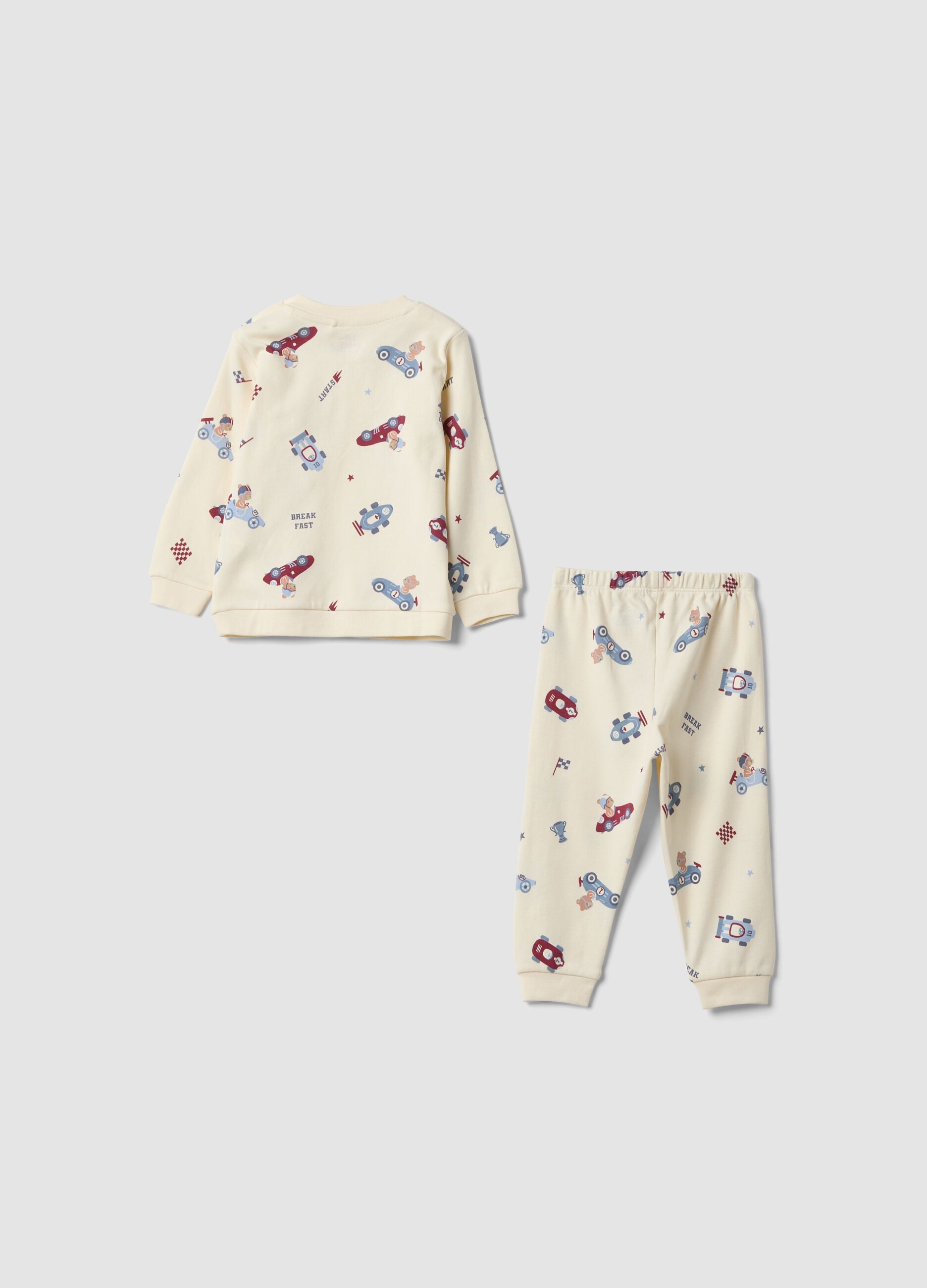 White organic cotton baby pyjamas with car print