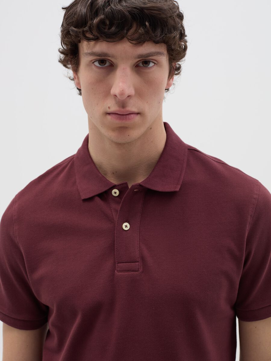 Solid colour polo shirt in organic cotton_2