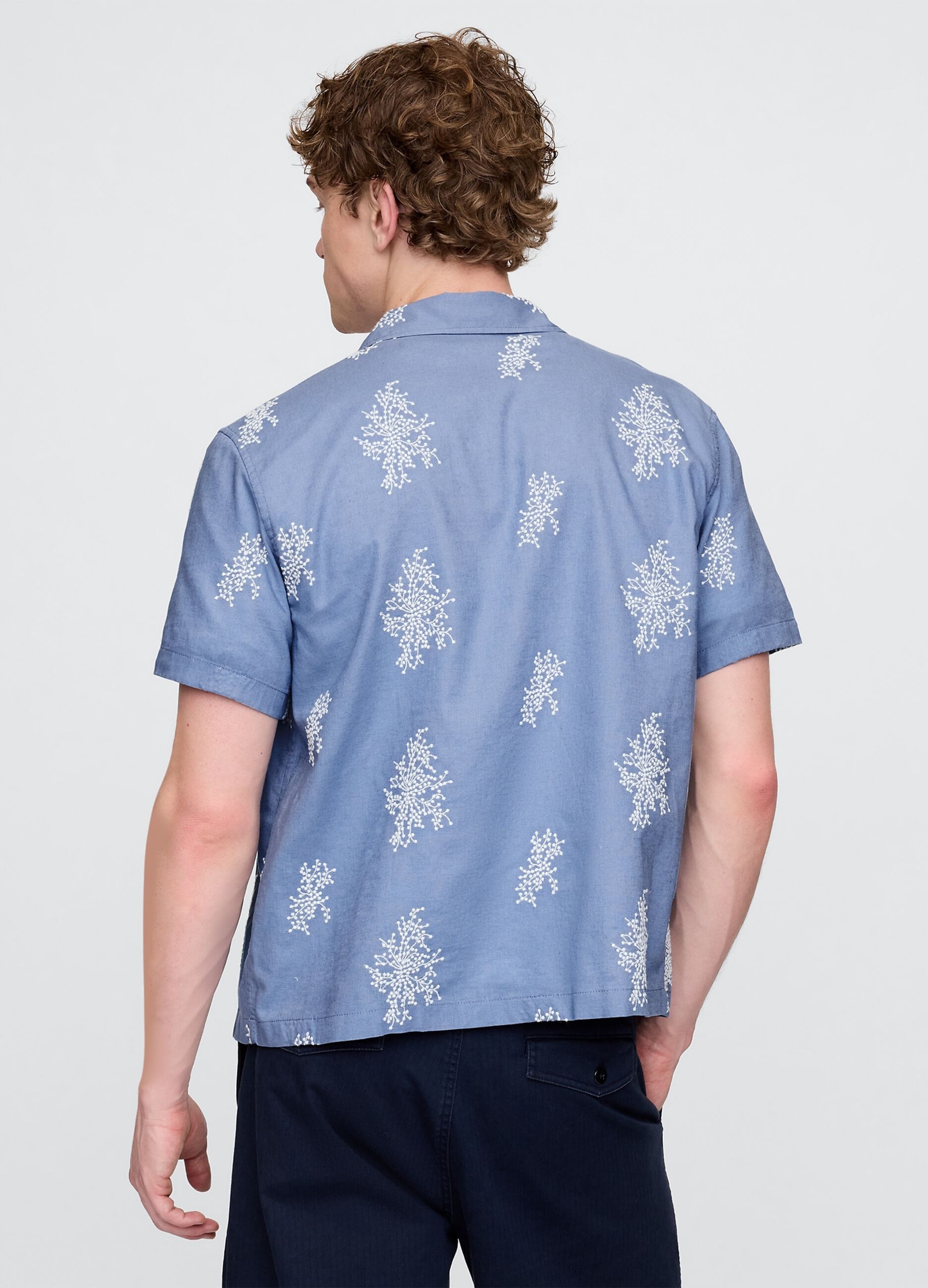 Light blue short sleeve shirt with floral print