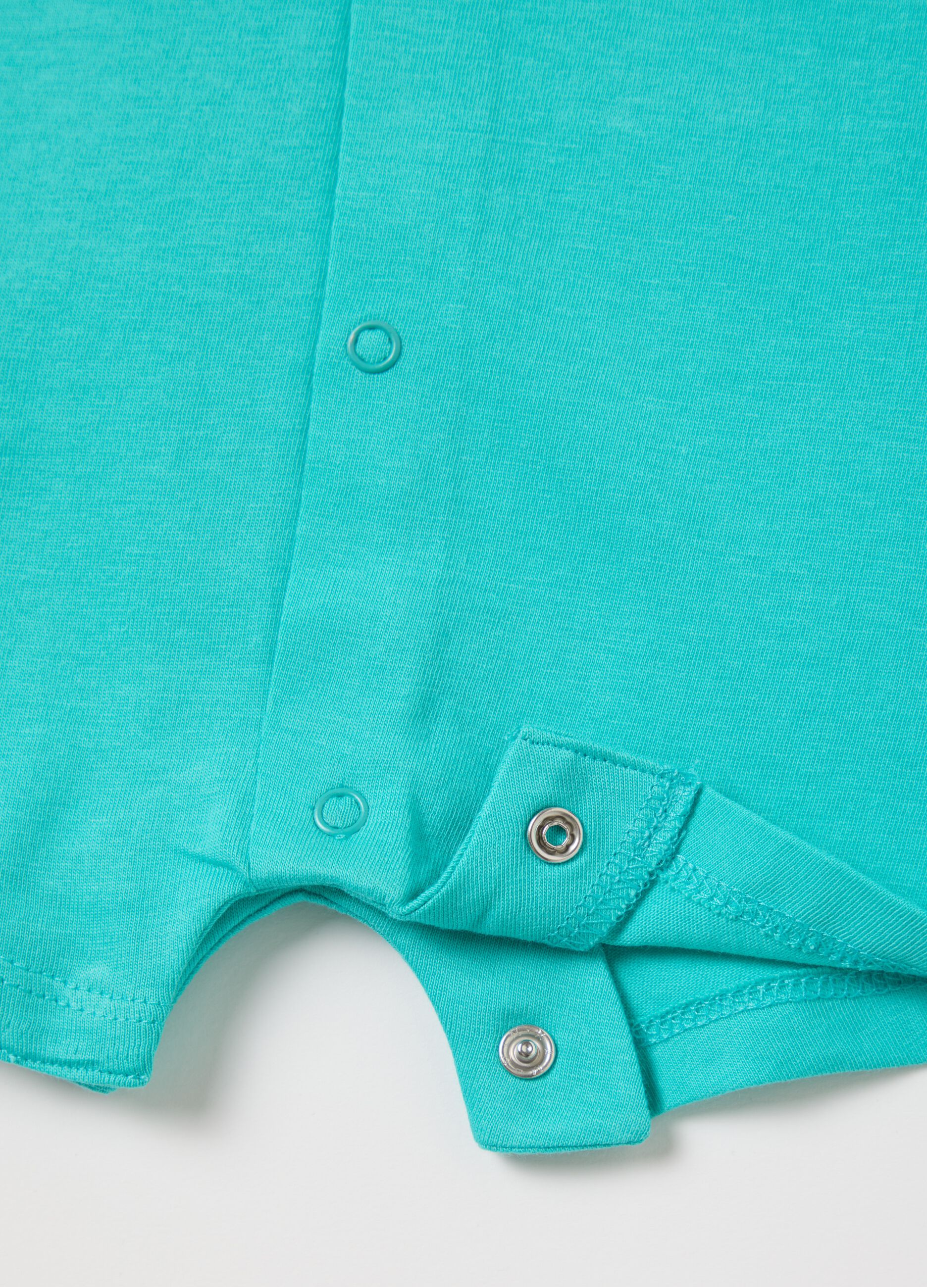 Two-pack white and light blue onesie in organic cotton with print