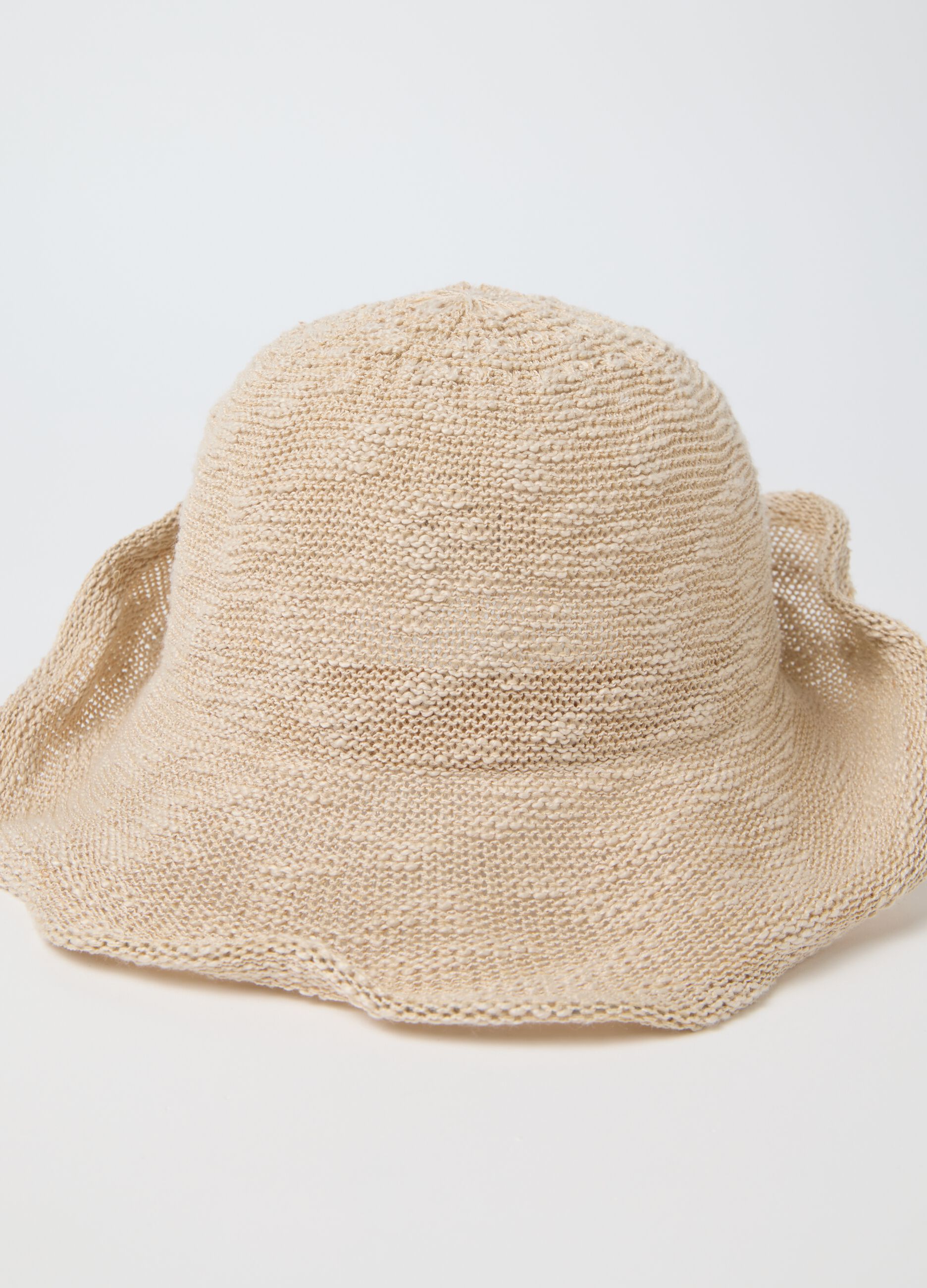 Beige cloche hat with knitted design