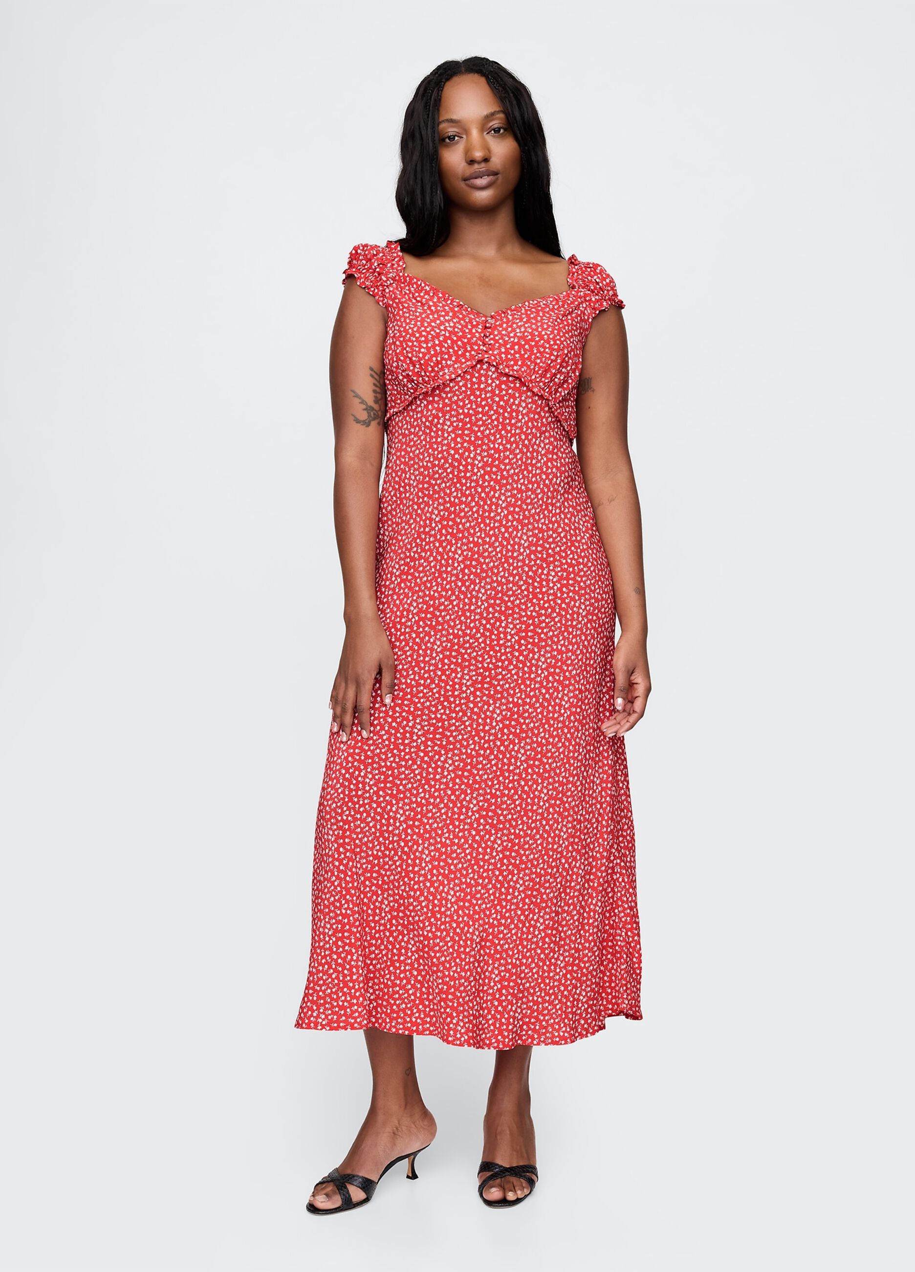 Sleeveless dress with floral pattern