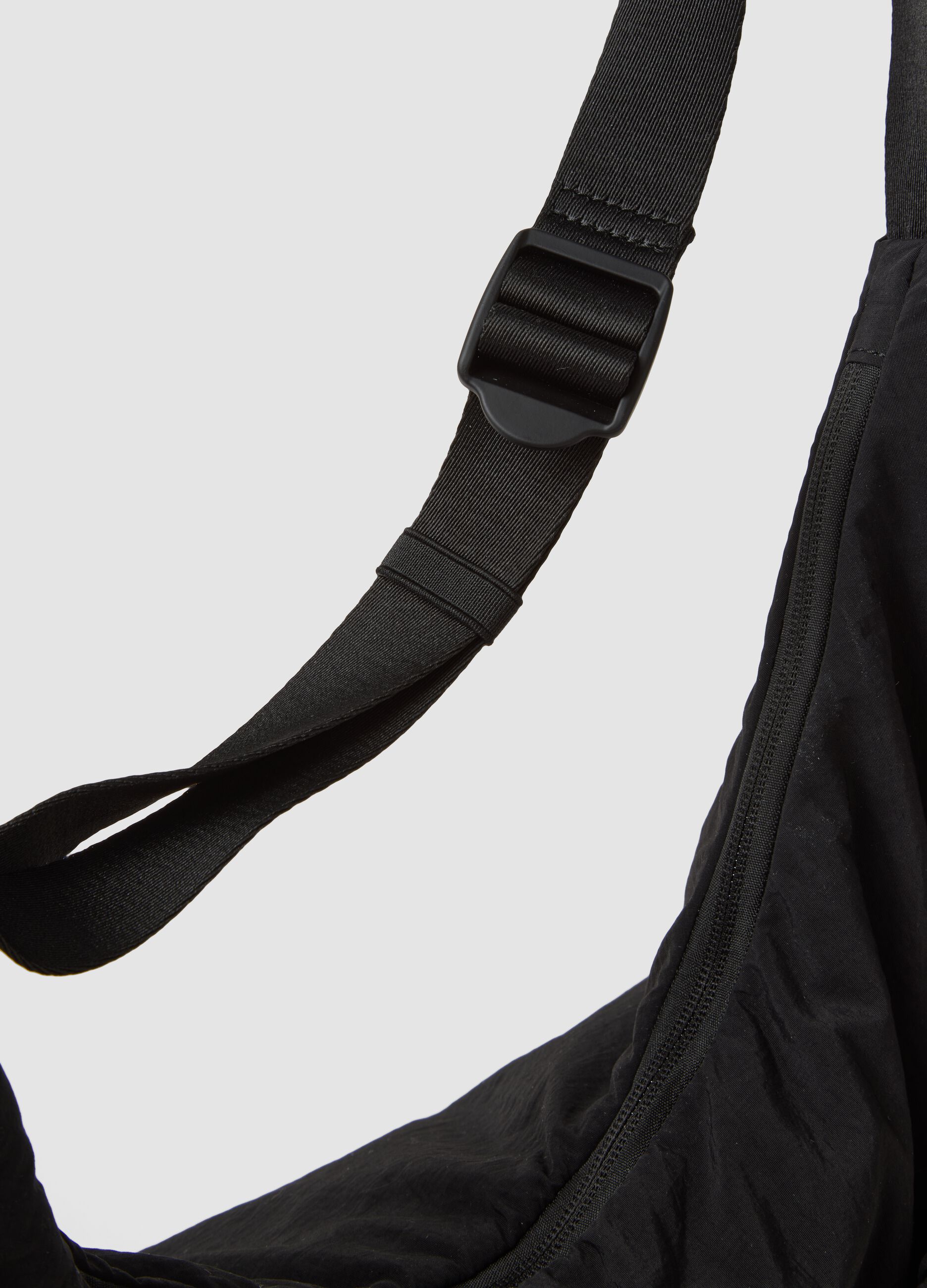 Black shoulder bag with adjustable strap