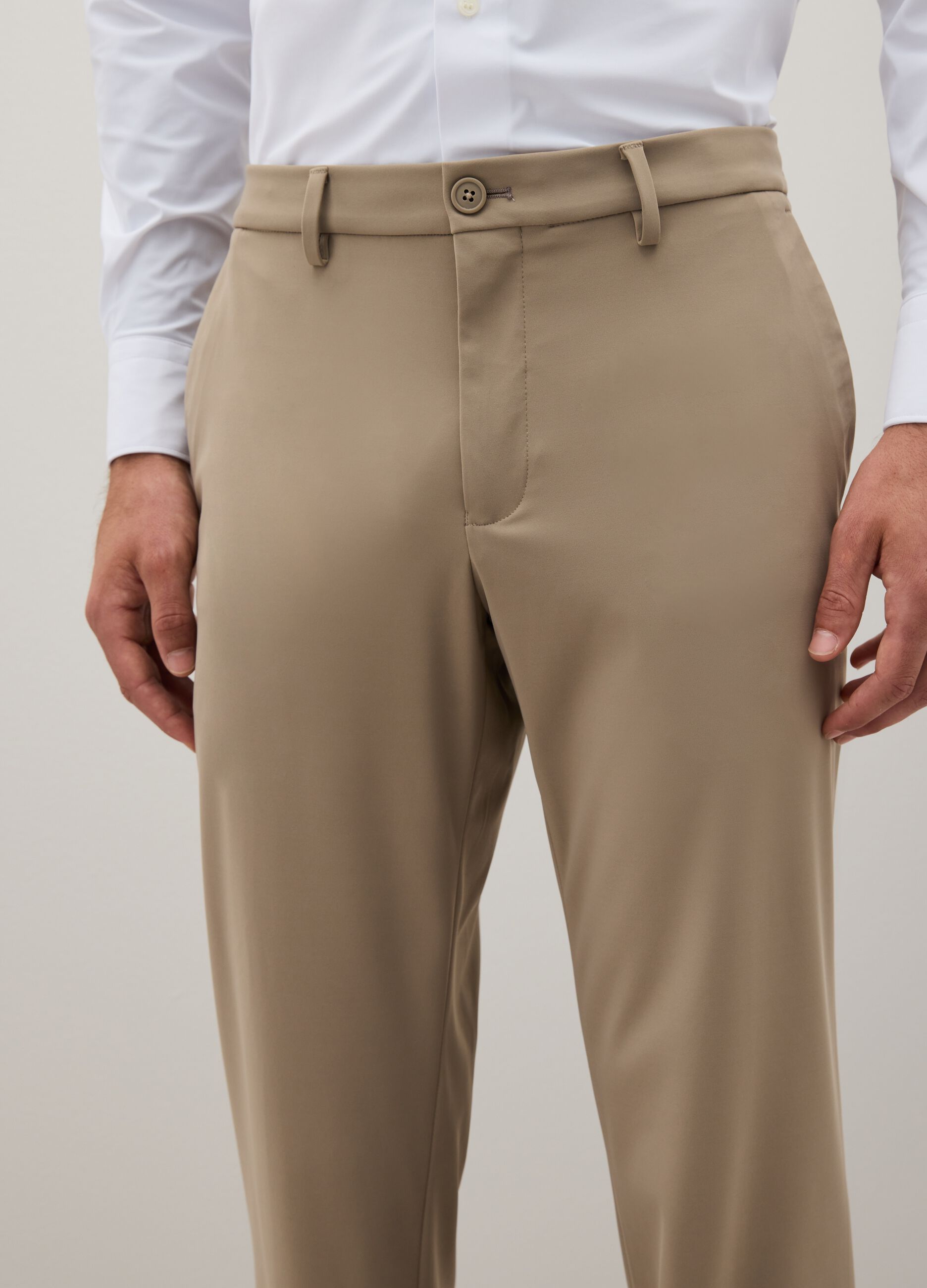 Beige slim fit trousers in stretch fabric