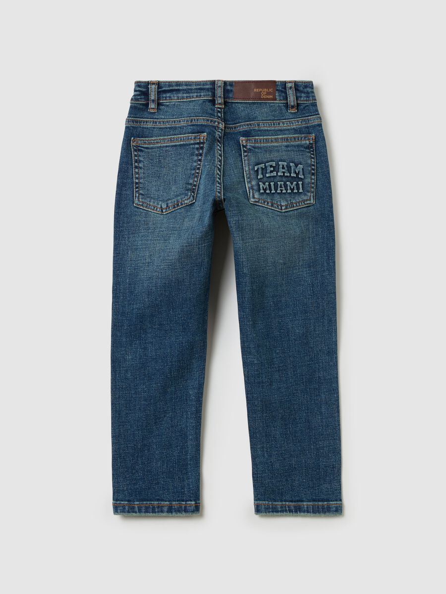 Straight-fit jeans with abrasions and print_1