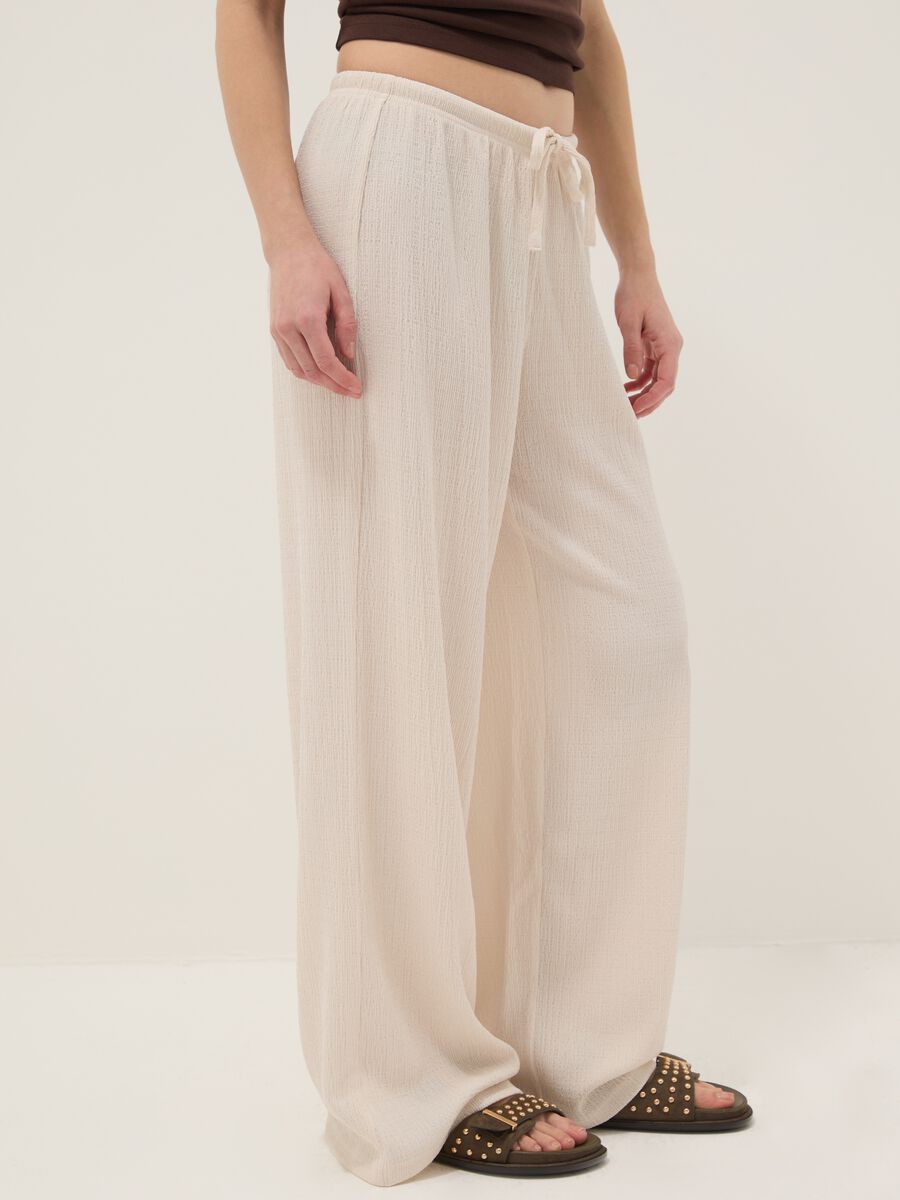 Beige wide leg jogger trousers_3