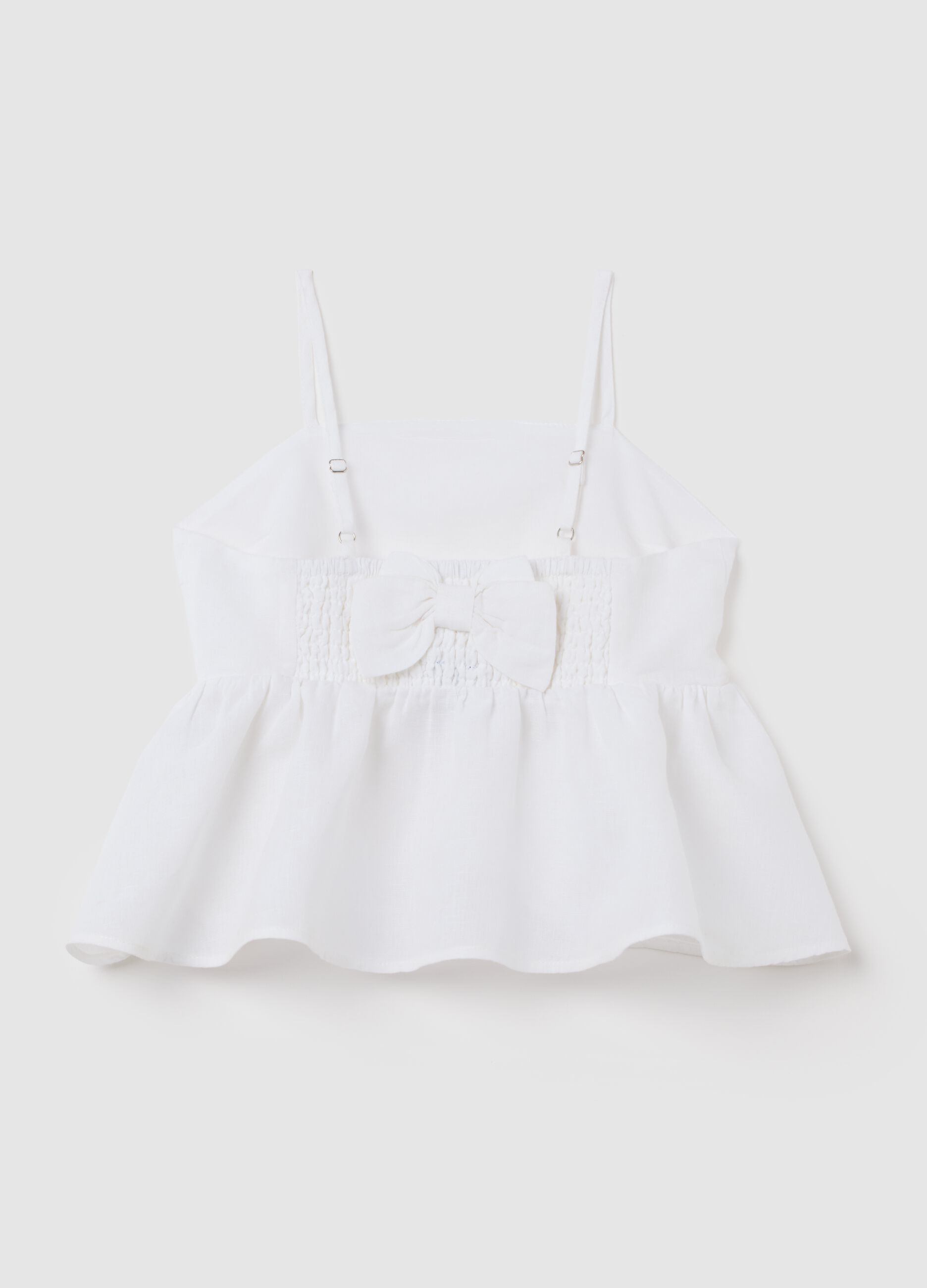 Girls' white cotton and linen top with regular fit, ruffles and bow at the back