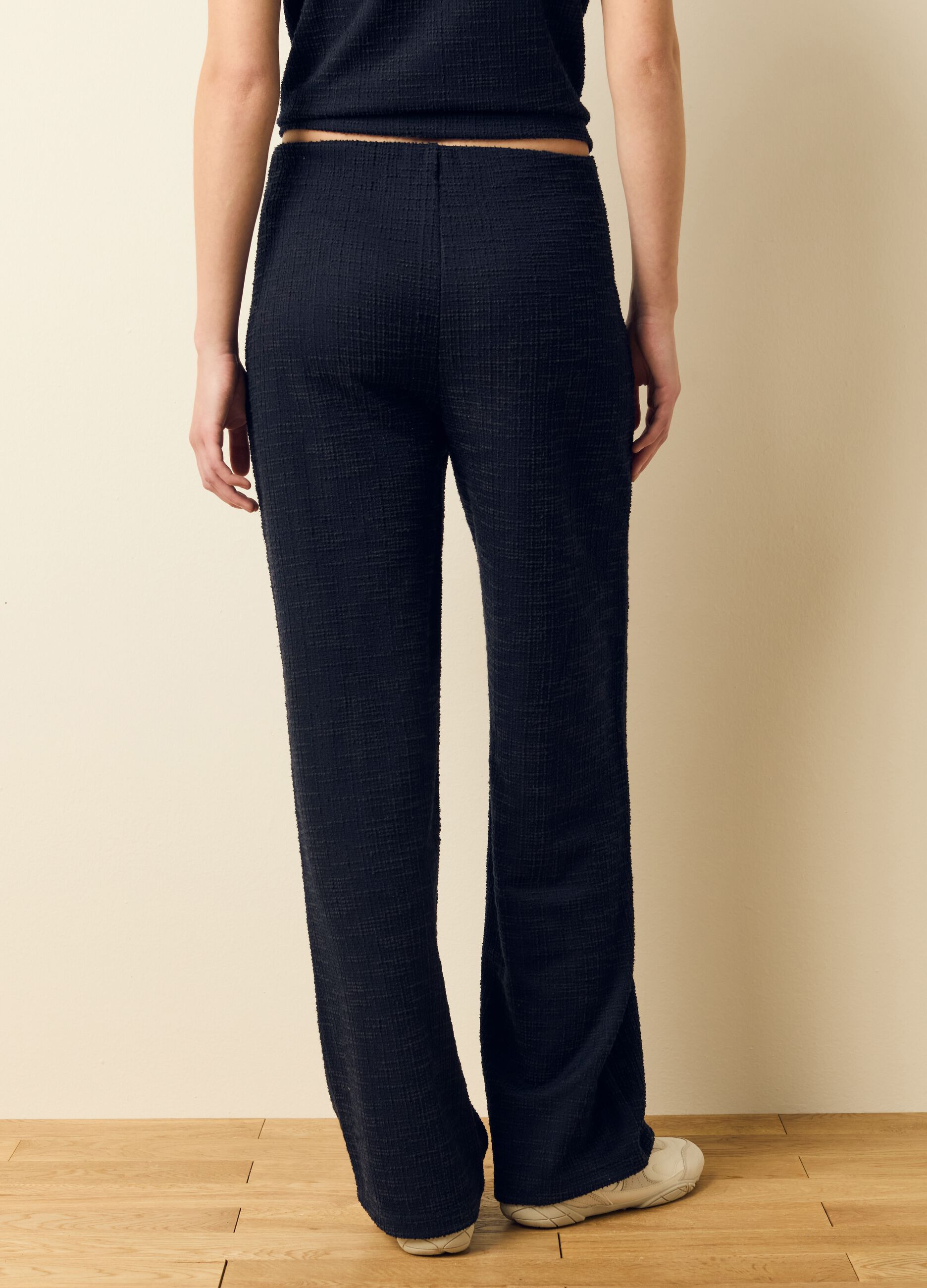Wide-leg trousers with woven design